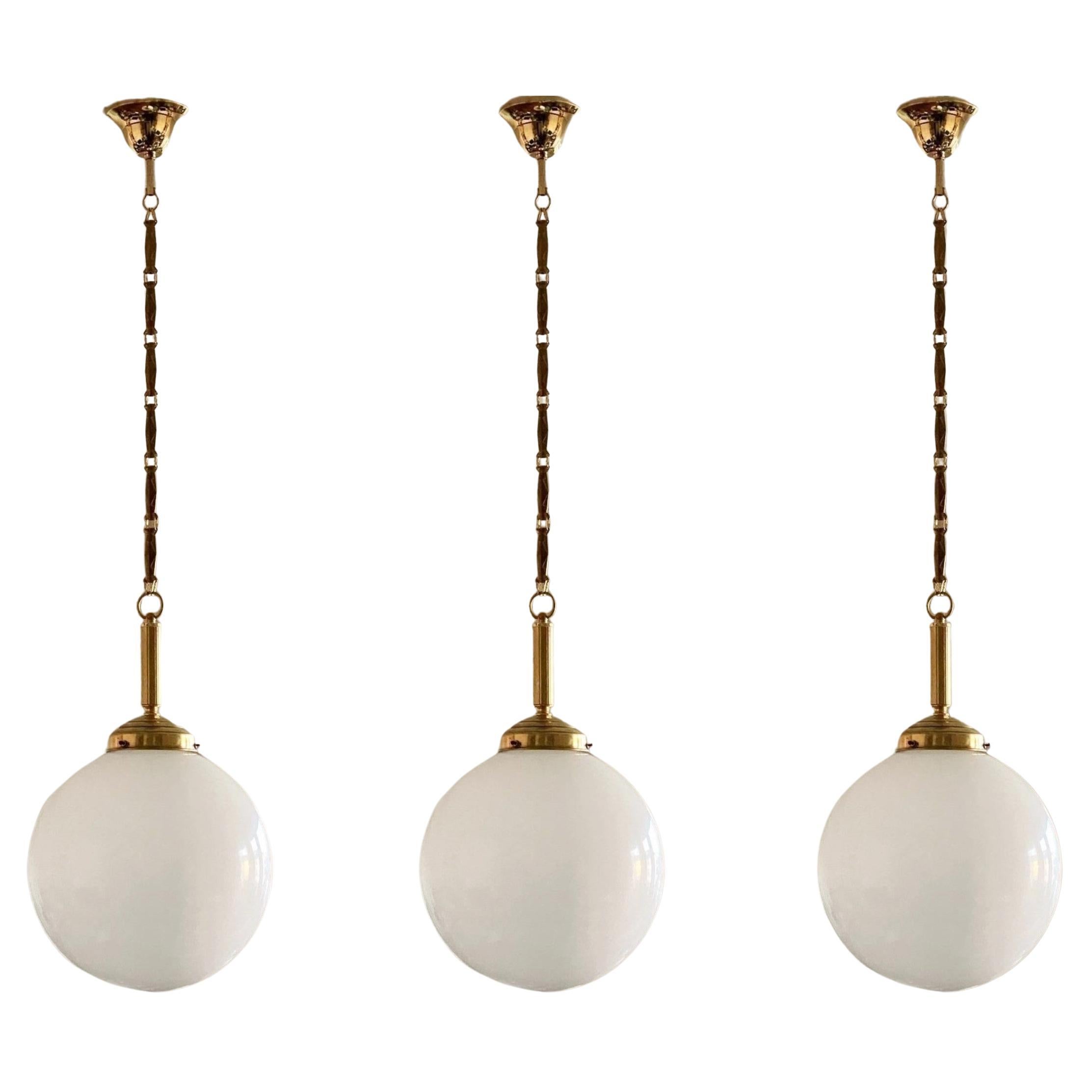 Set of Three Italian Art Deco Hand Blown Opaline Glass Brass Pendants, 1940s For Sale