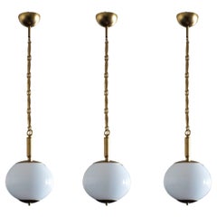 Set of Three Italian Art Deco Opaline Glass and Brass Pendants, 1950's