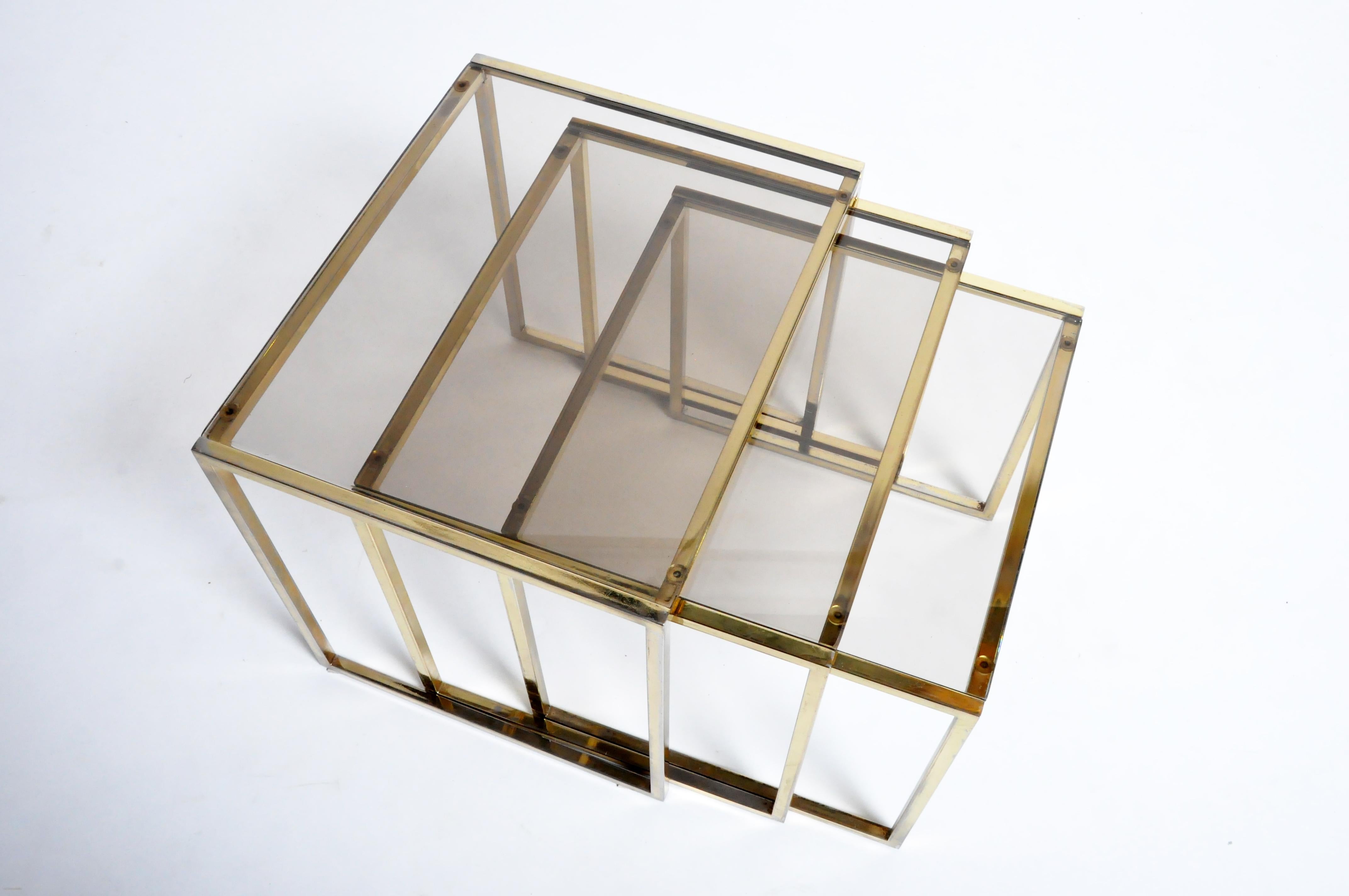 Elegant set of nesting tables from Italy made from grass and glass, circa 1970. Wear consistent with age and use.