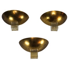 Set of three Italian Deco-style brass wall sconces, Italy 1970s