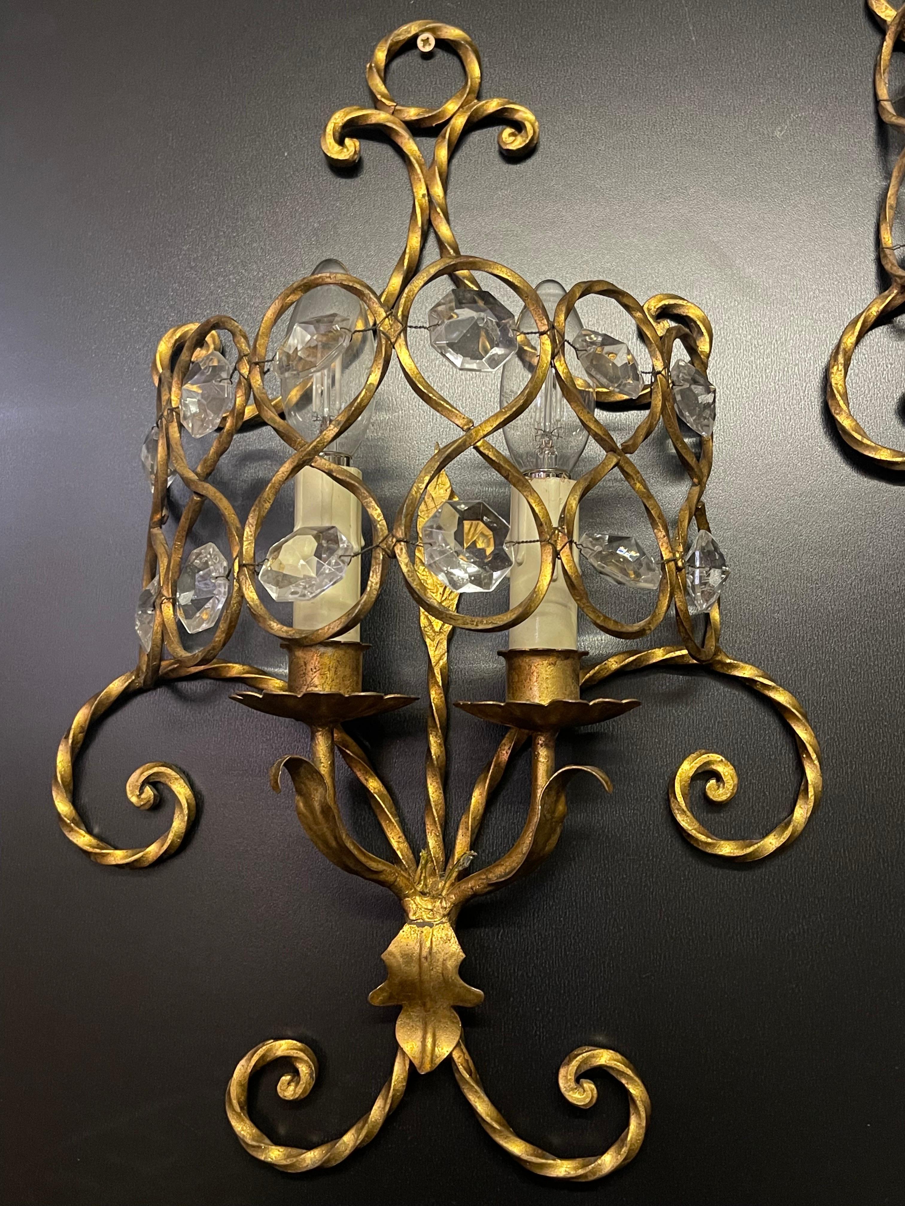 Late 20th Century Set of Three Italian Gilt Iron and Crystal Light Fixtures, circa 1970s For Sale