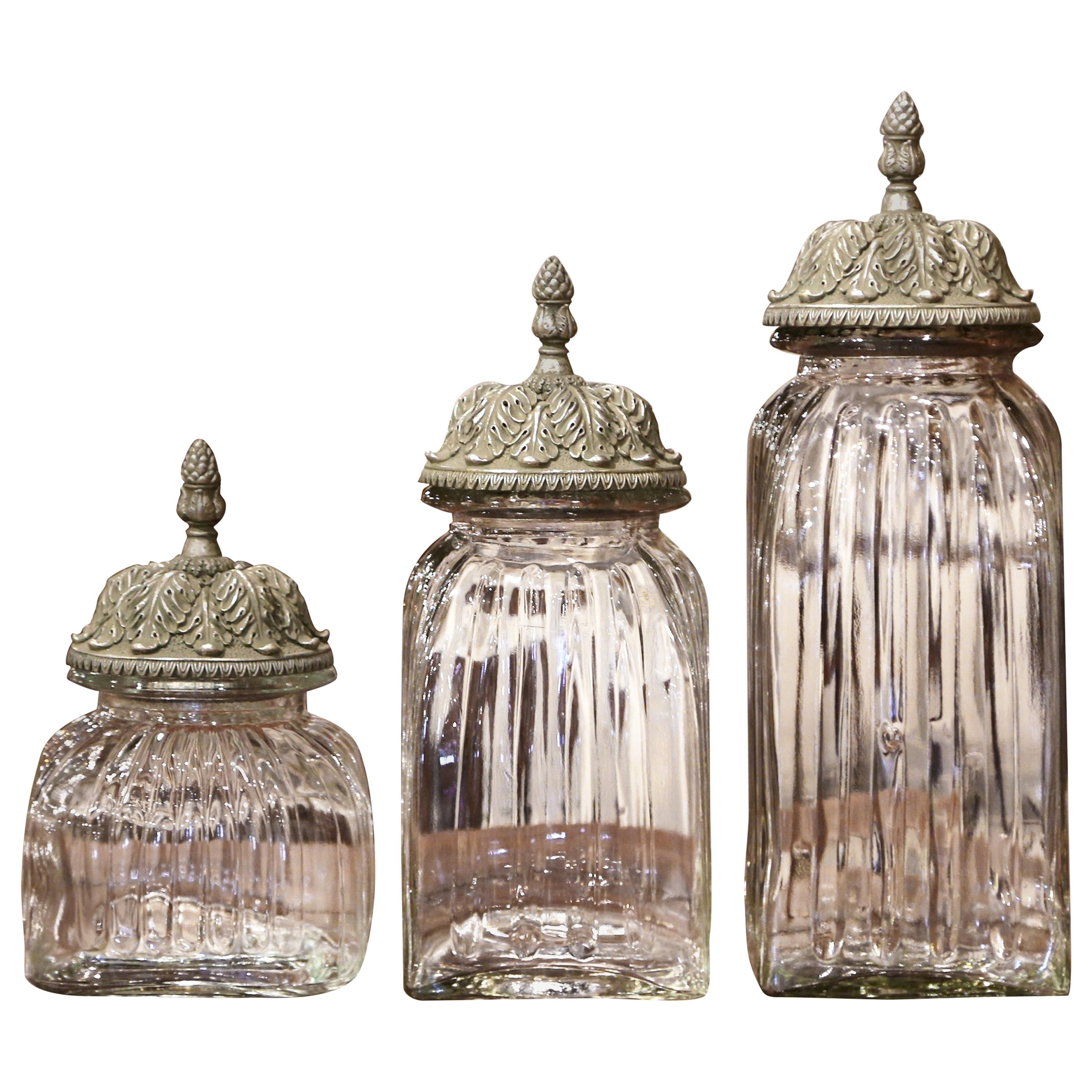 Set of Three Italian Glass Ginger Jars with Carved Silver Paint Lids