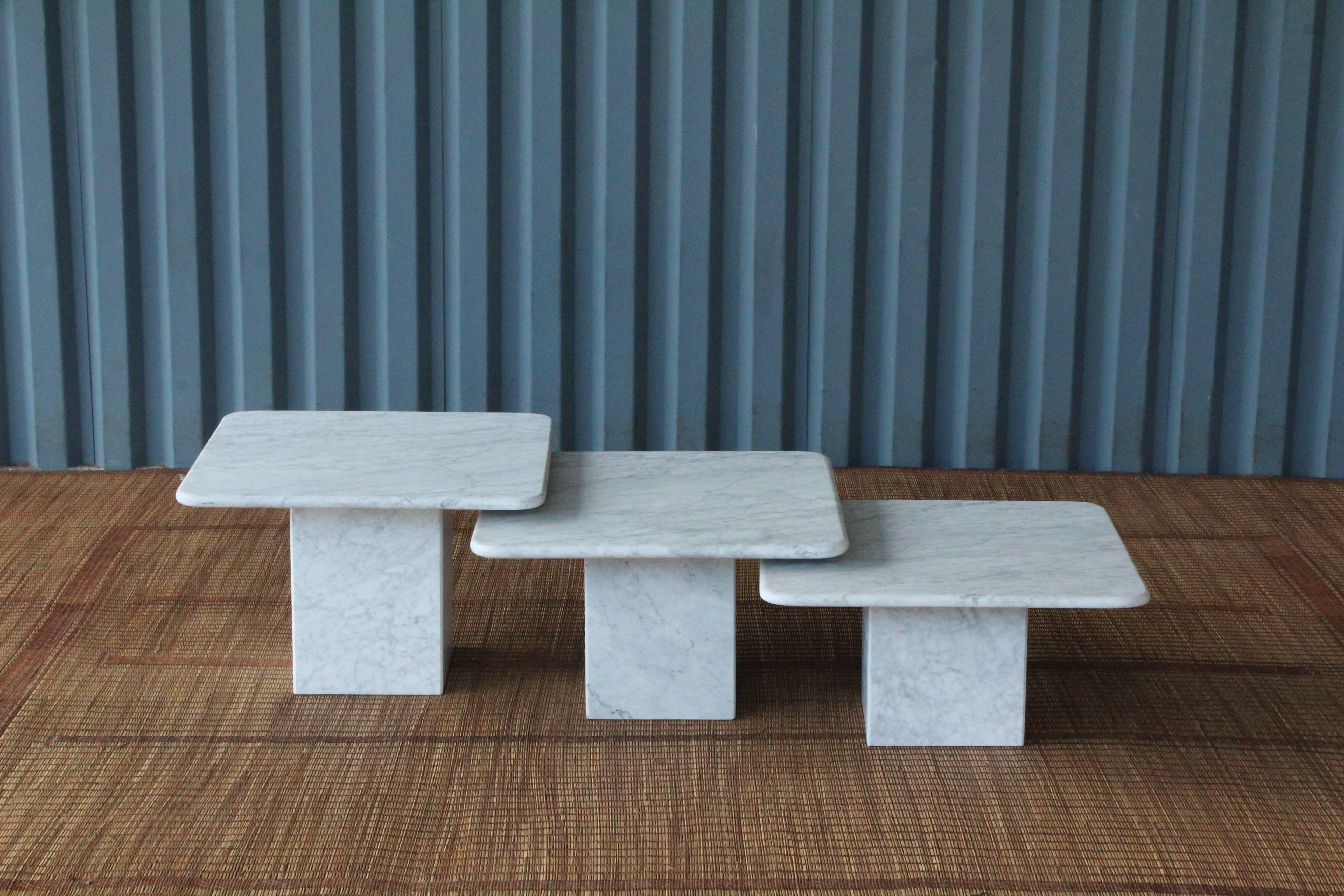 Gorgeous set of three Italian marble nesting tables with a honed finish. Sizes range from 16 inches in height to 12 inches in height.