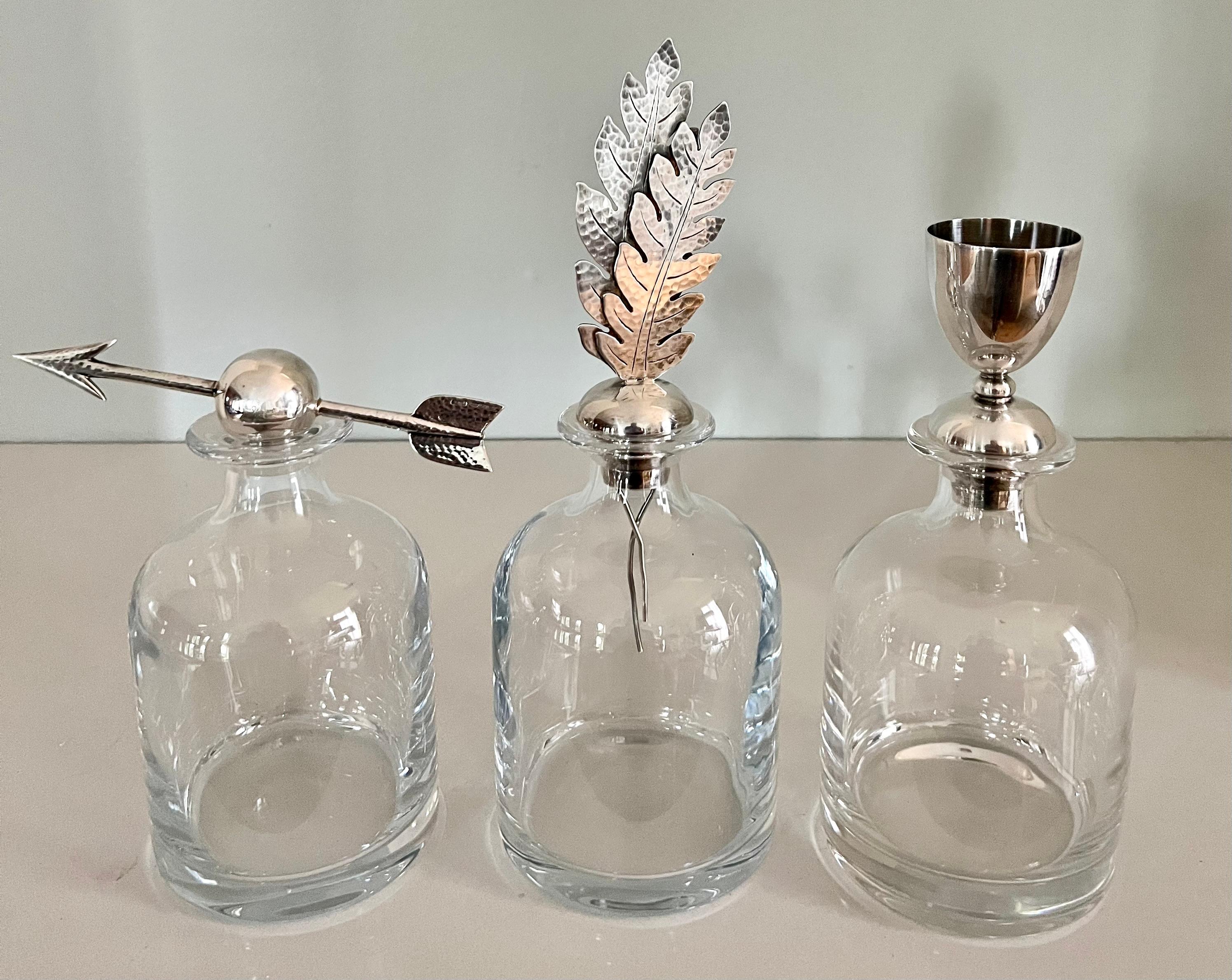 Very hard to find -- set of crystal Italian Pampaloni bottles with silver toppers. A wonderful decorative element to any room, or can be used to hold and decant liquids. 


Bottles are 4