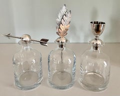 Set of Three Italian Pampaloni Crystal Decanters with Unique Silver Toppers