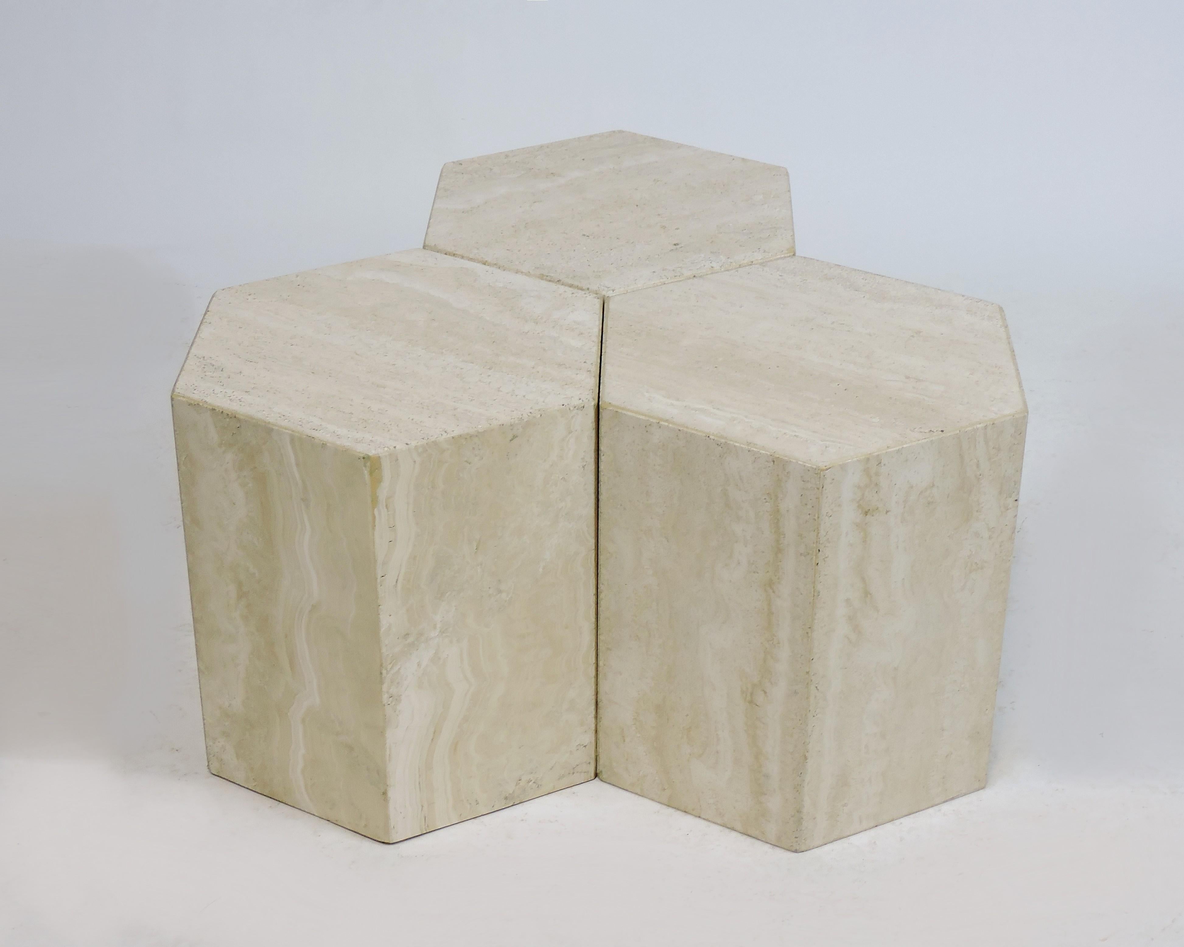 Beautiful set of three Italian modern travertine tables from the 1970s. These tables are fabricated from 3/4