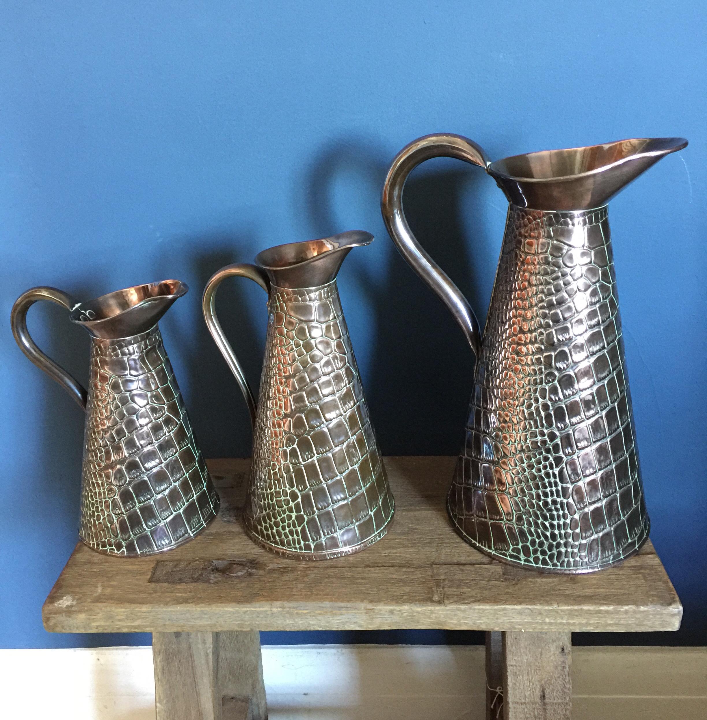 Arts and Crafts Set of Three Joseph Sankey & Son Copper Crocodile Jugs, circa 1900 For Sale