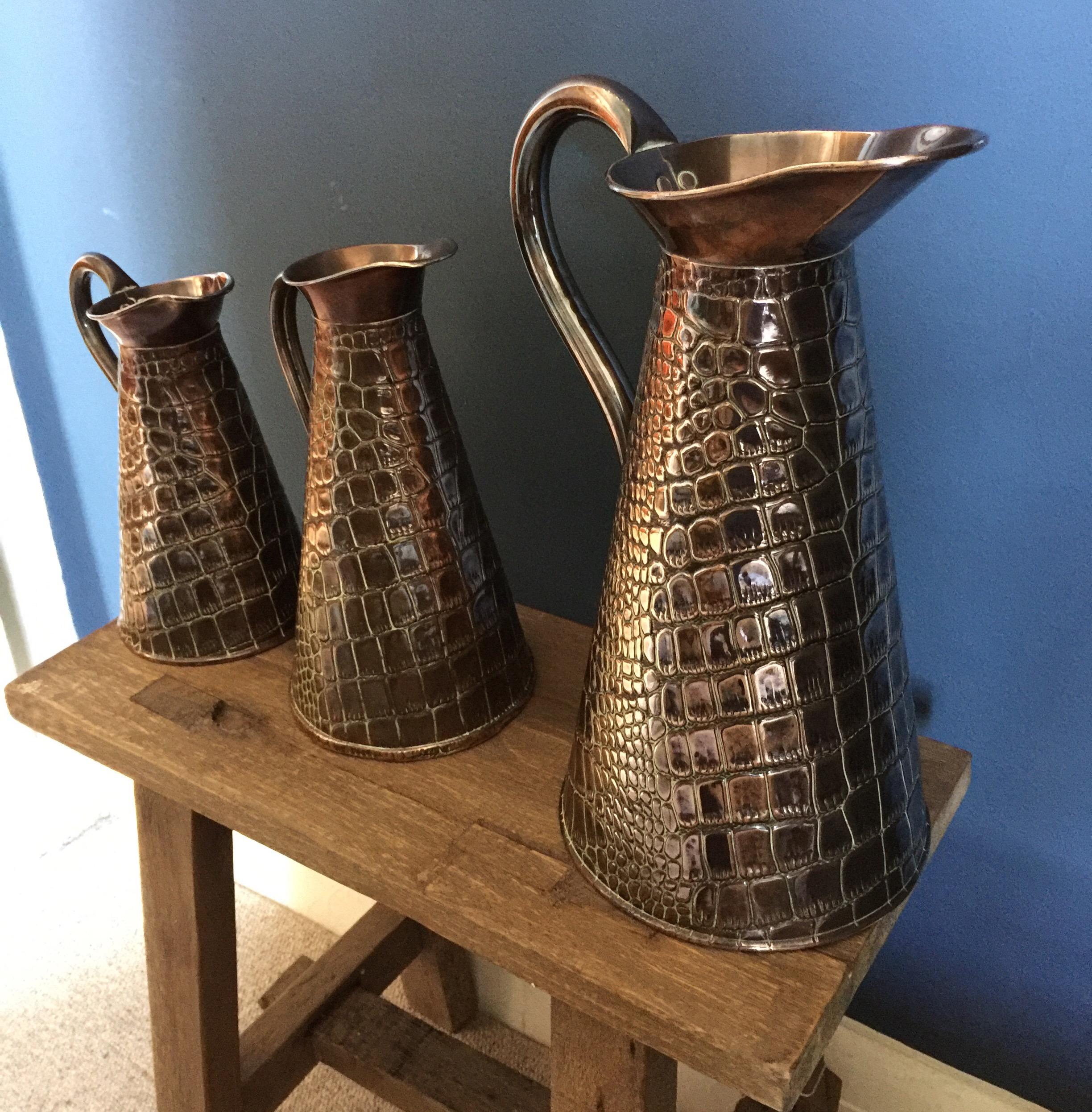 English Set of Three Joseph Sankey & Son Copper Crocodile Jugs, circa 1900 For Sale