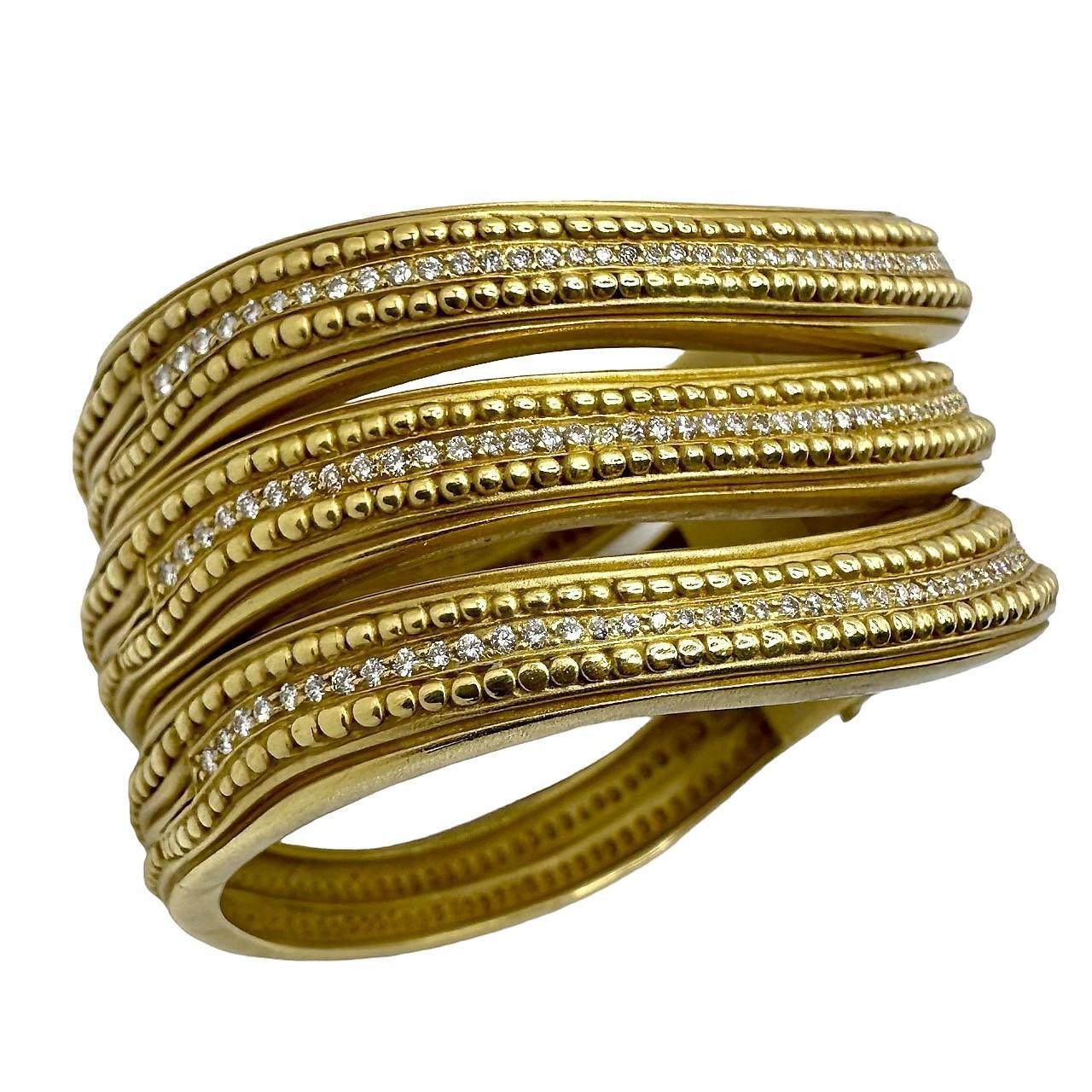 A distinctive set of three vintage Kieselstein Cord 18K yellow gold and diamond 