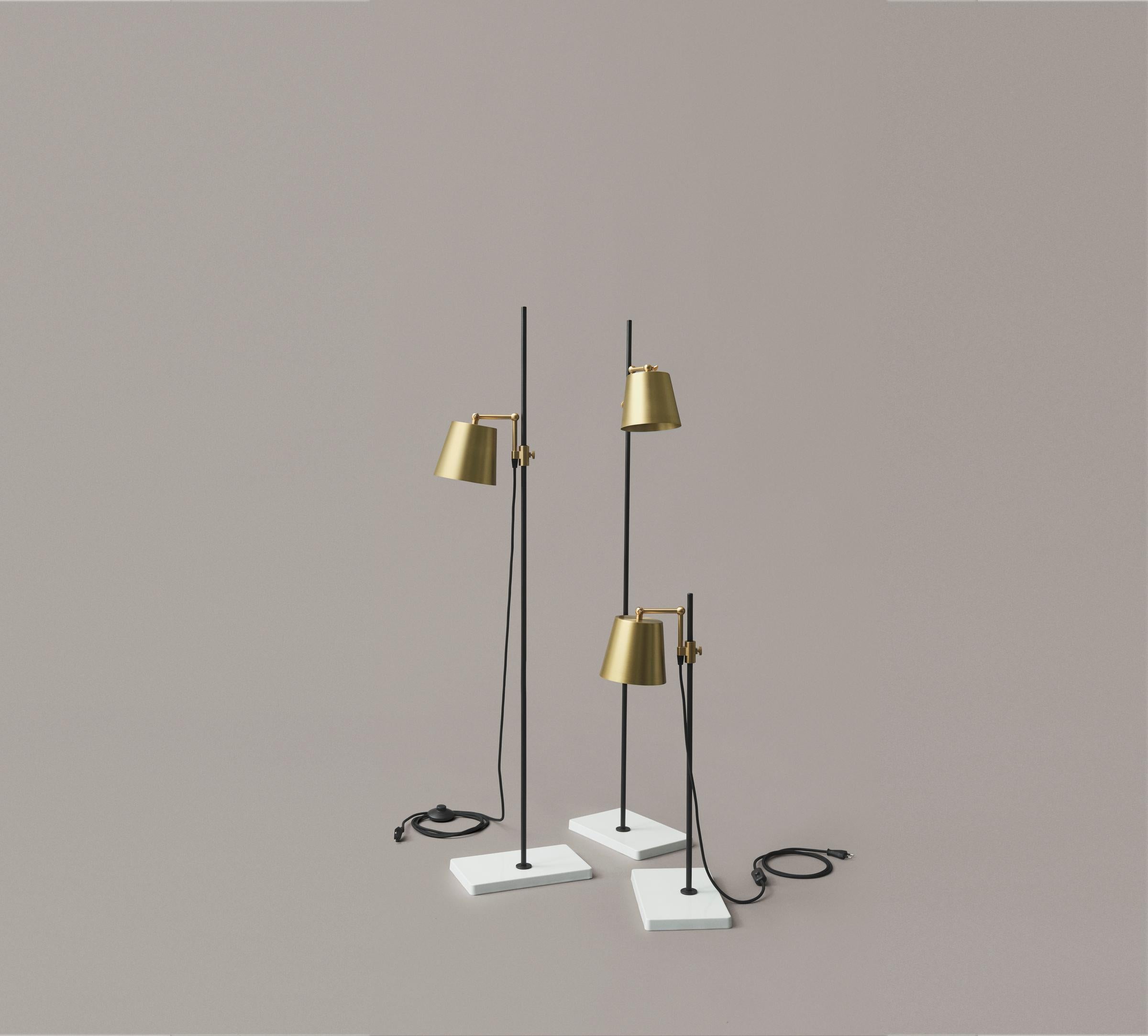 Table and floor lamps designed by Anatomy Design in 2010. 
Two table lamps and one floor lamp in this set.

The Lab Light design came about from a genuine fascination with laboratory equipment and with all those fantastic clamps and levers — the