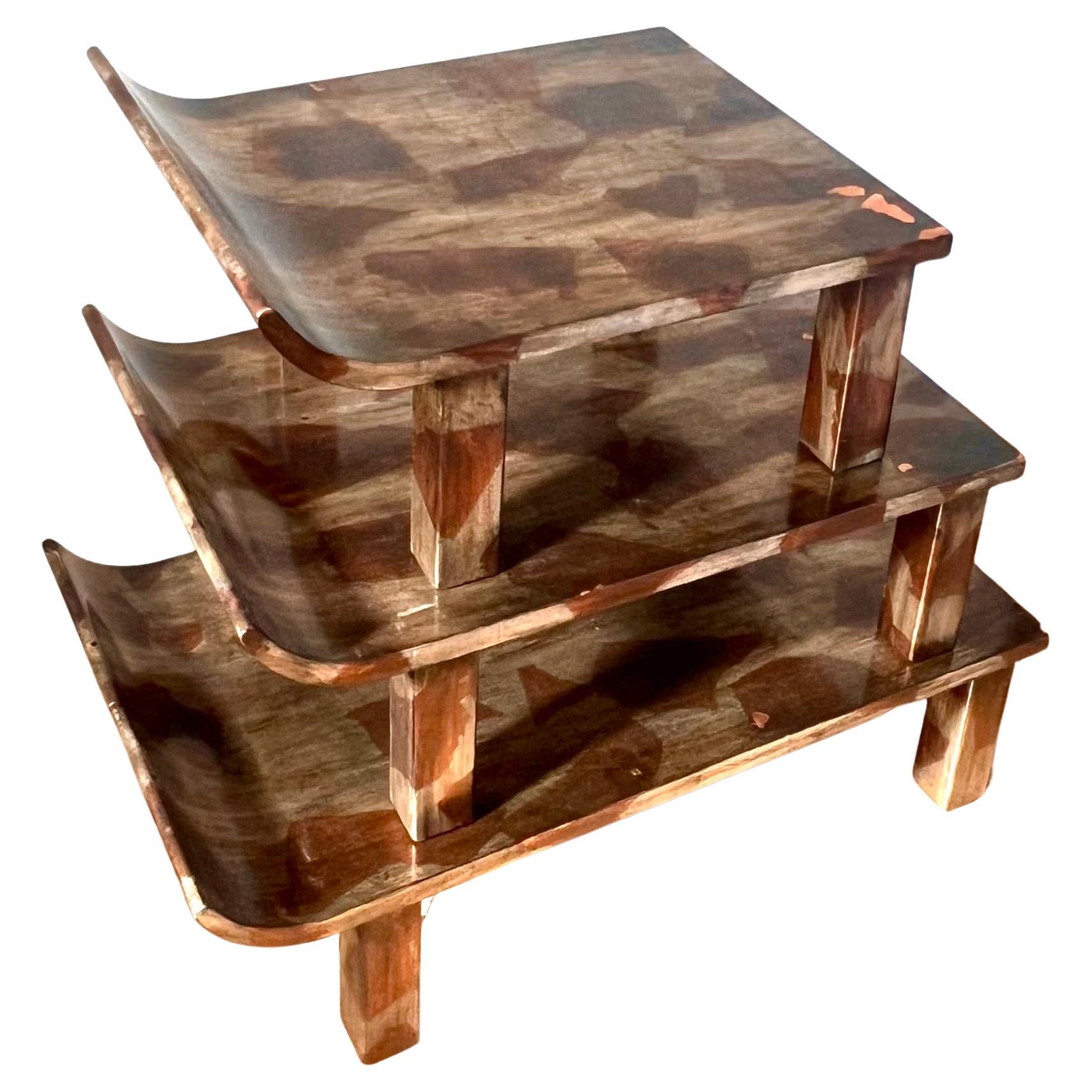Set of three lacquered maple wood stacking tables by Truex, 21st century