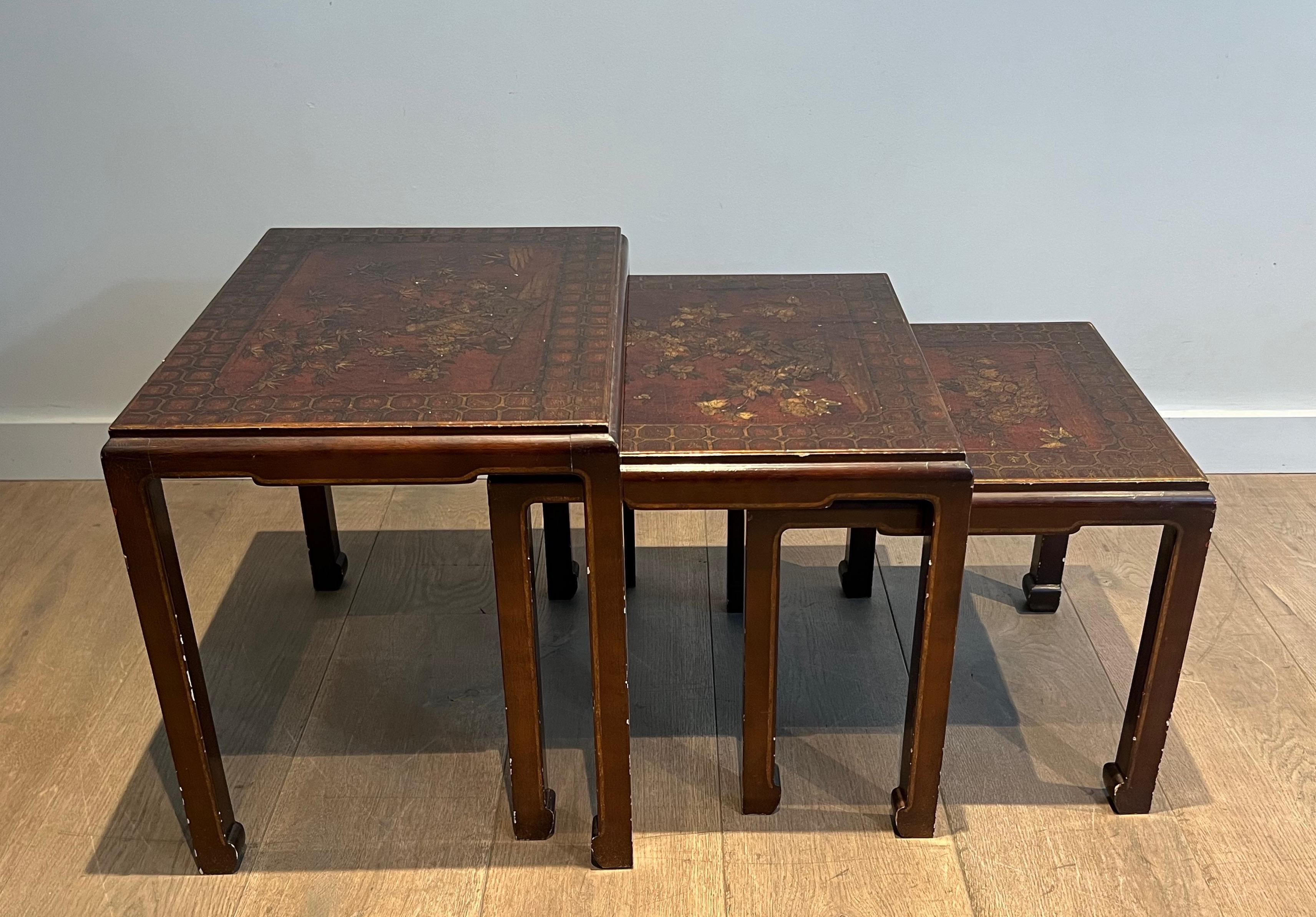 Gilt Set of Three Lacquered Nesting Tables with Chinese Scenes. Circa 1940 For Sale