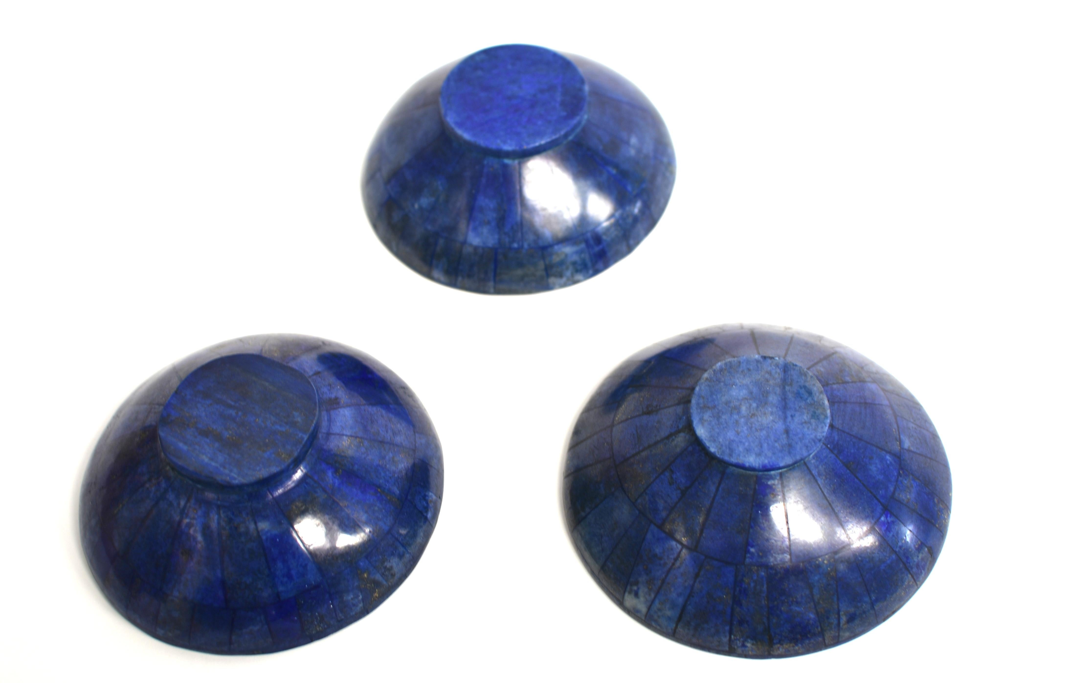 A set of beautiful natural lapis lazuli bowls. Of the classic dou li / hiragata shapes with round openings, the bowls are made of carefully selected fine grade lapis panels. Brilliant, saturated royal blue with dust of gold and white. Elegant