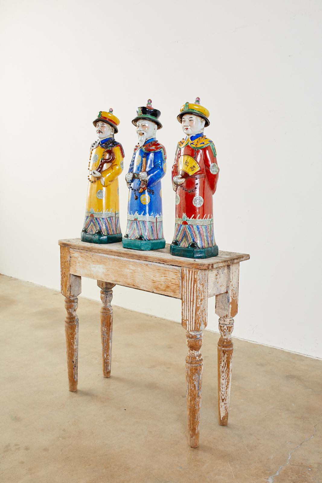 Hand-Crafted Set of Three Large Chinese Porcelain Qing Emperor Figures