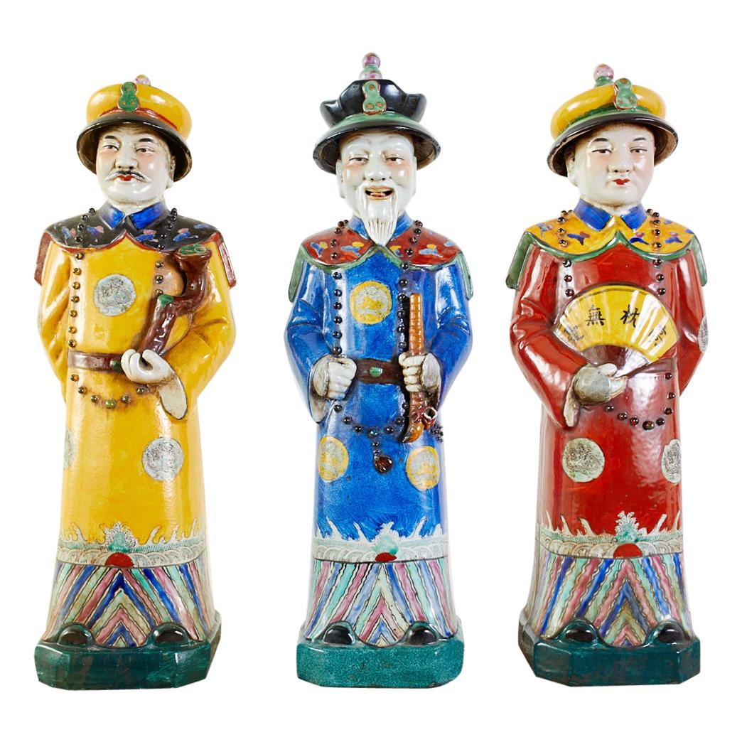 Set of Three Large Chinese Porcelain Qing Emperor Figures