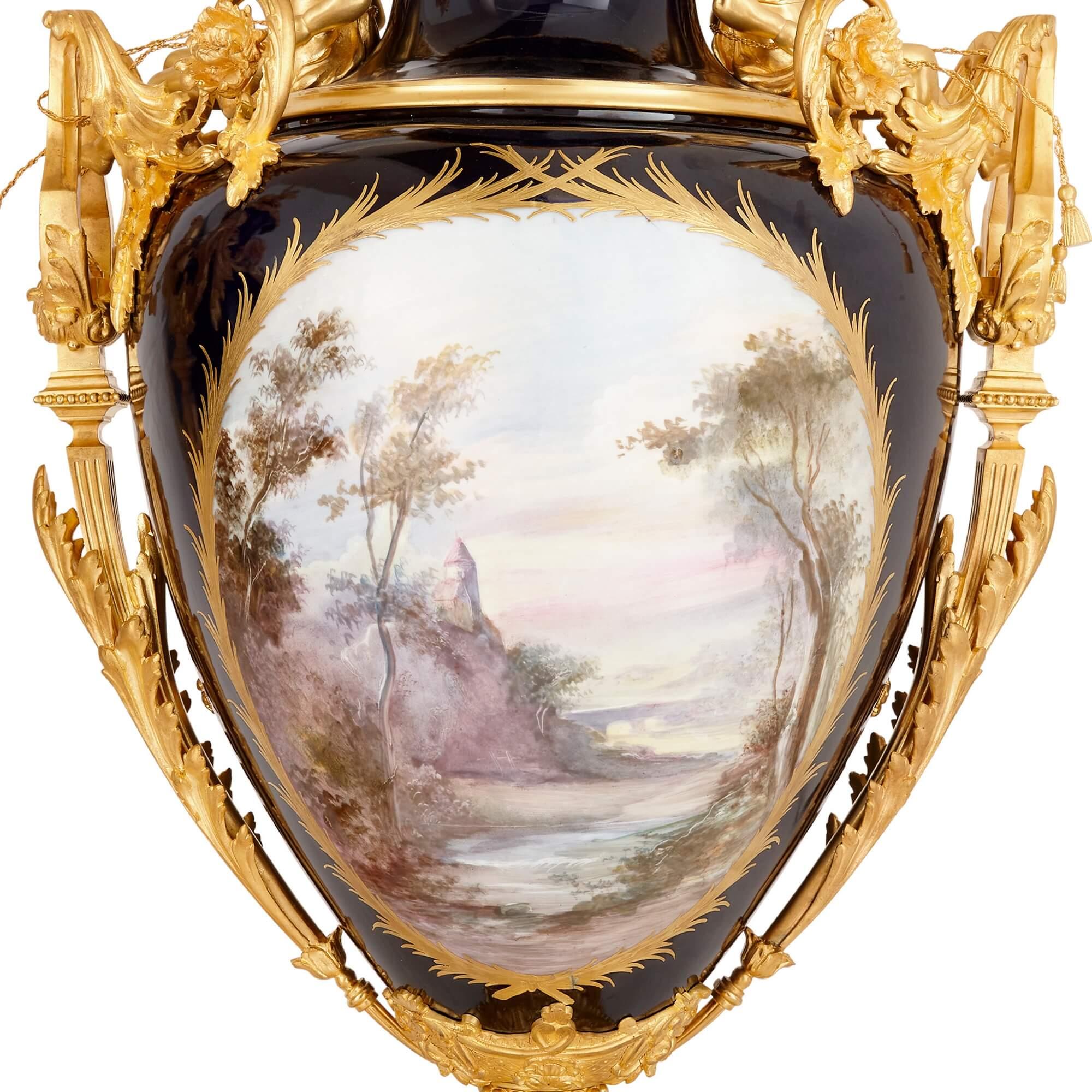 Set of Three Large Sèvres Style Porcelain Vases with Gilt Bronze Pedestals For Sale 10