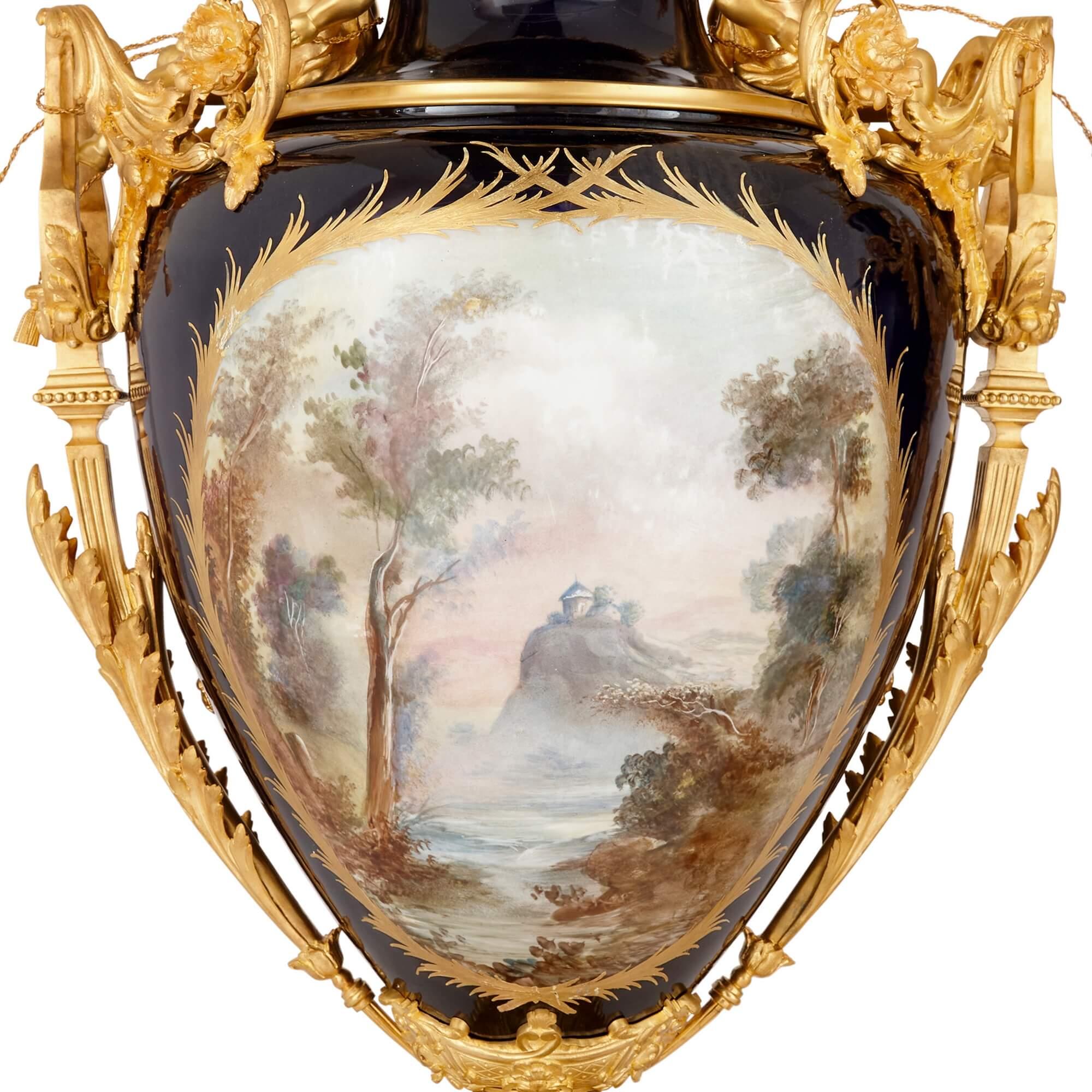 Set of Three Large Sèvres Style Porcelain Vases with Gilt Bronze Pedestals For Sale 11