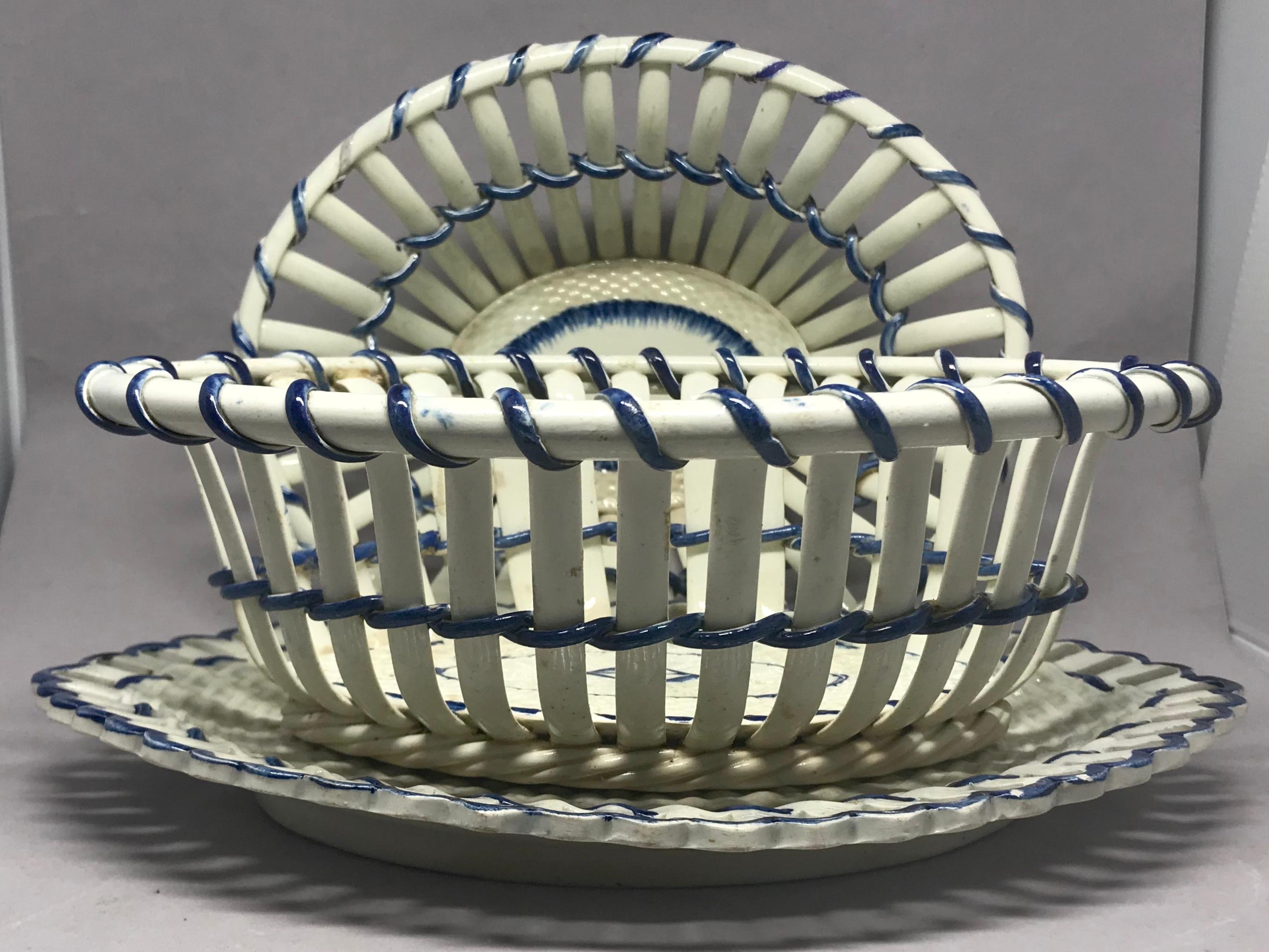 Set of three Leedsware lattice baskets and underplate. Cobalt blue trimmed cream colored basketweave patterned pottery tray with reticulated border and stamped I-H for J.Heath, Hanley 9 and 10 impressed marks. Good condition with one repair to one