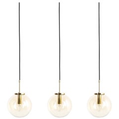 Set of Three Limburg Amber Glass Pendant Lamps, Germany, 1970