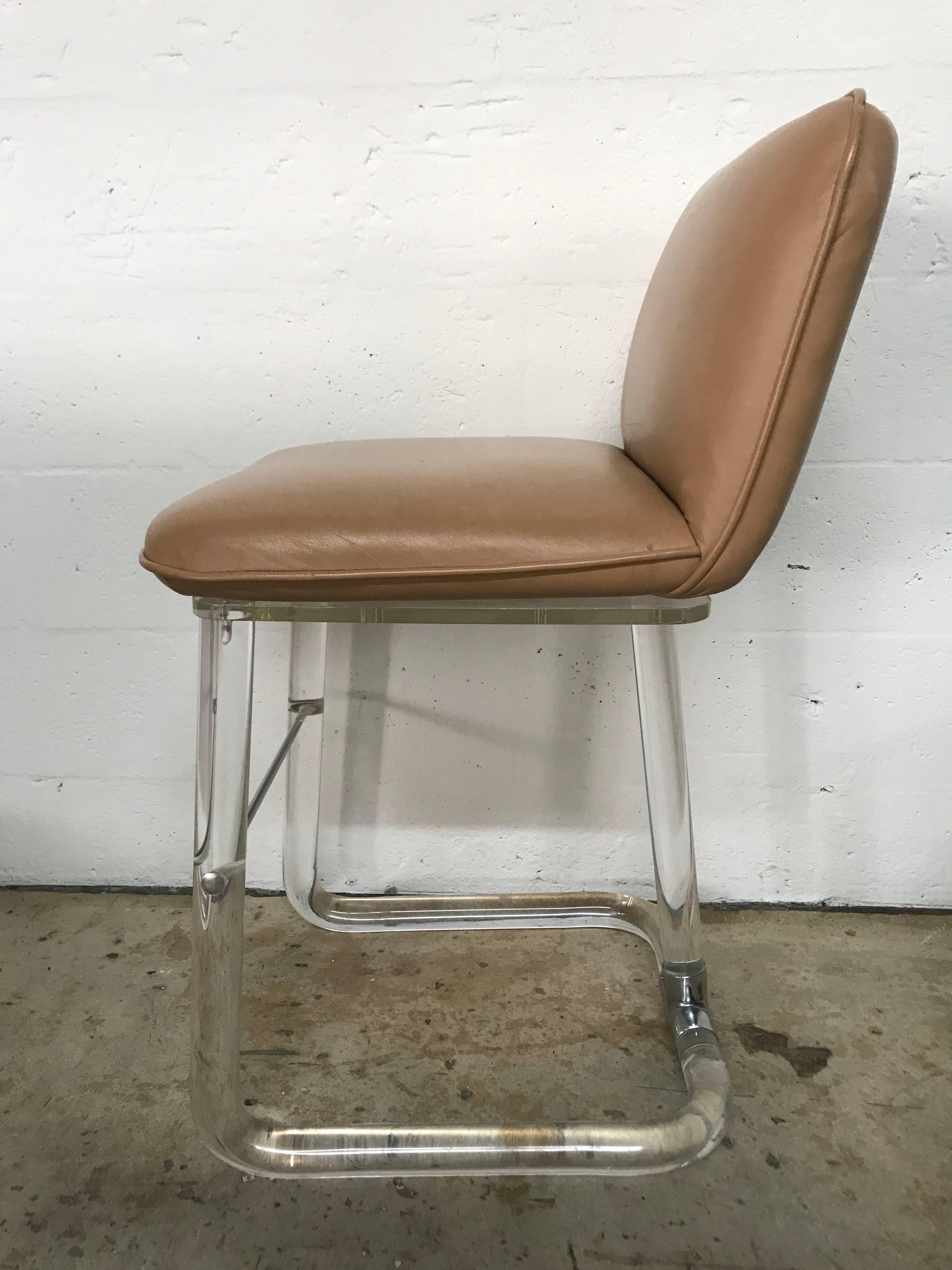 Mid-Century Modern Set of Three Lion in Frost Lucite and Leather Swivel Bar or Counter Stools