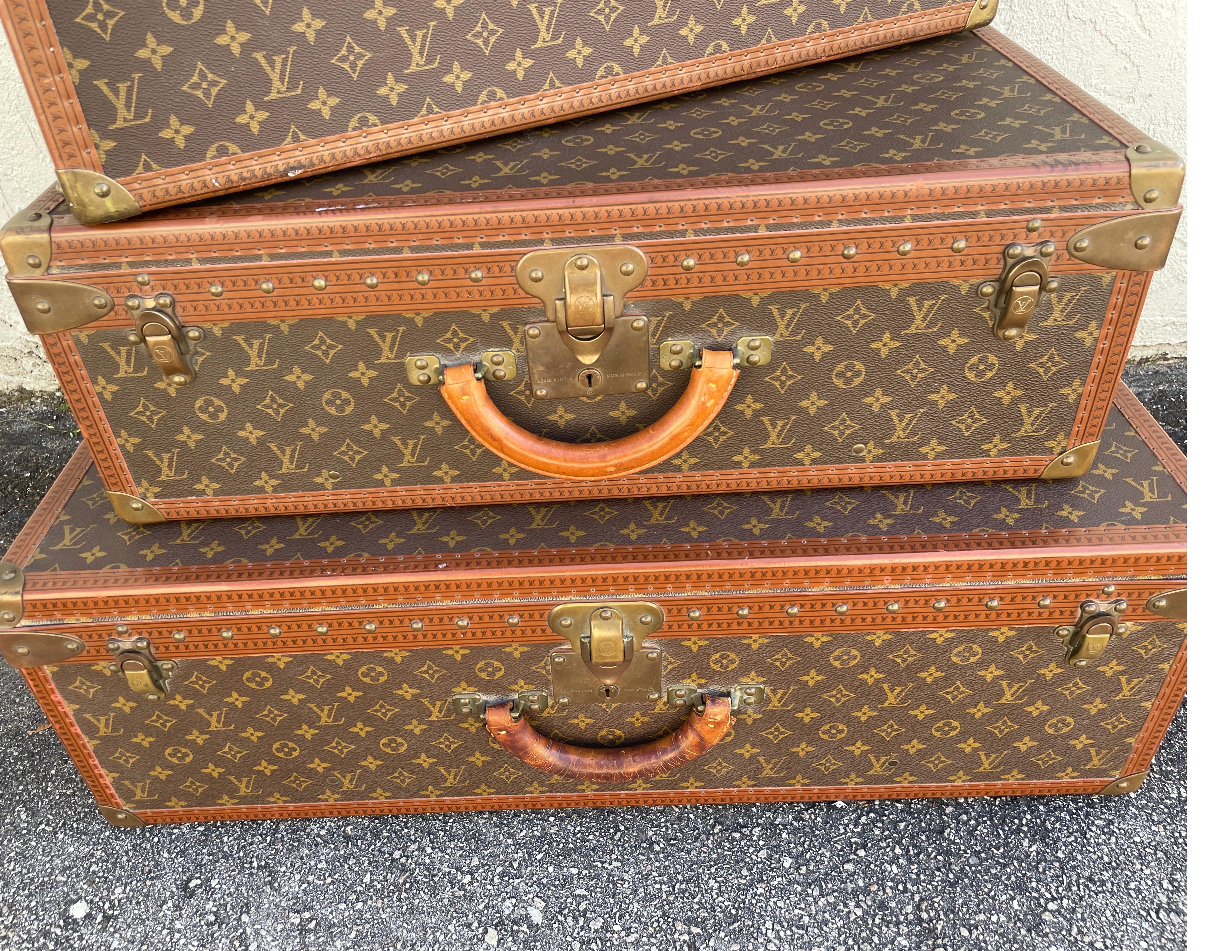 Brass Set of Three Louis Vuitton Hard Sided Suitcases For Sale