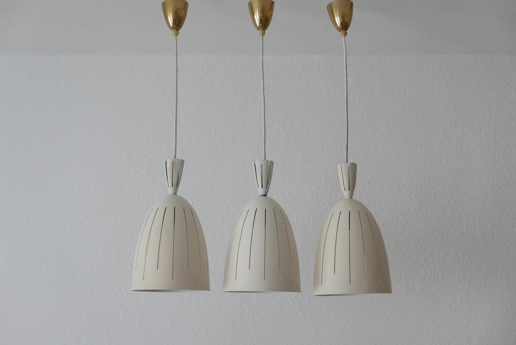 Lacquered Set of Three Lovely Mid-Century Modern Diabolo Pendant Lamps, 1950s, Germany For Sale