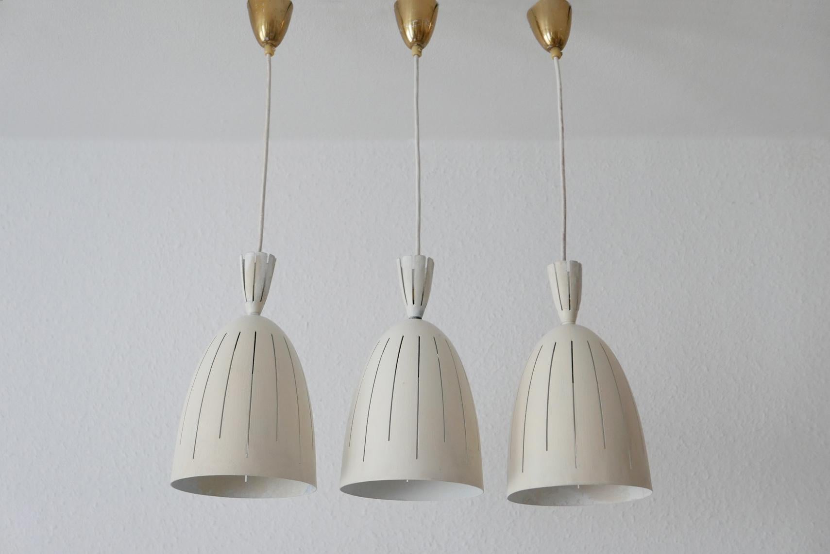 Set of Three Lovely Mid-Century Modern Diabolo Pendant Lamps, 1950s, Germany In Good Condition For Sale In Munich, DE