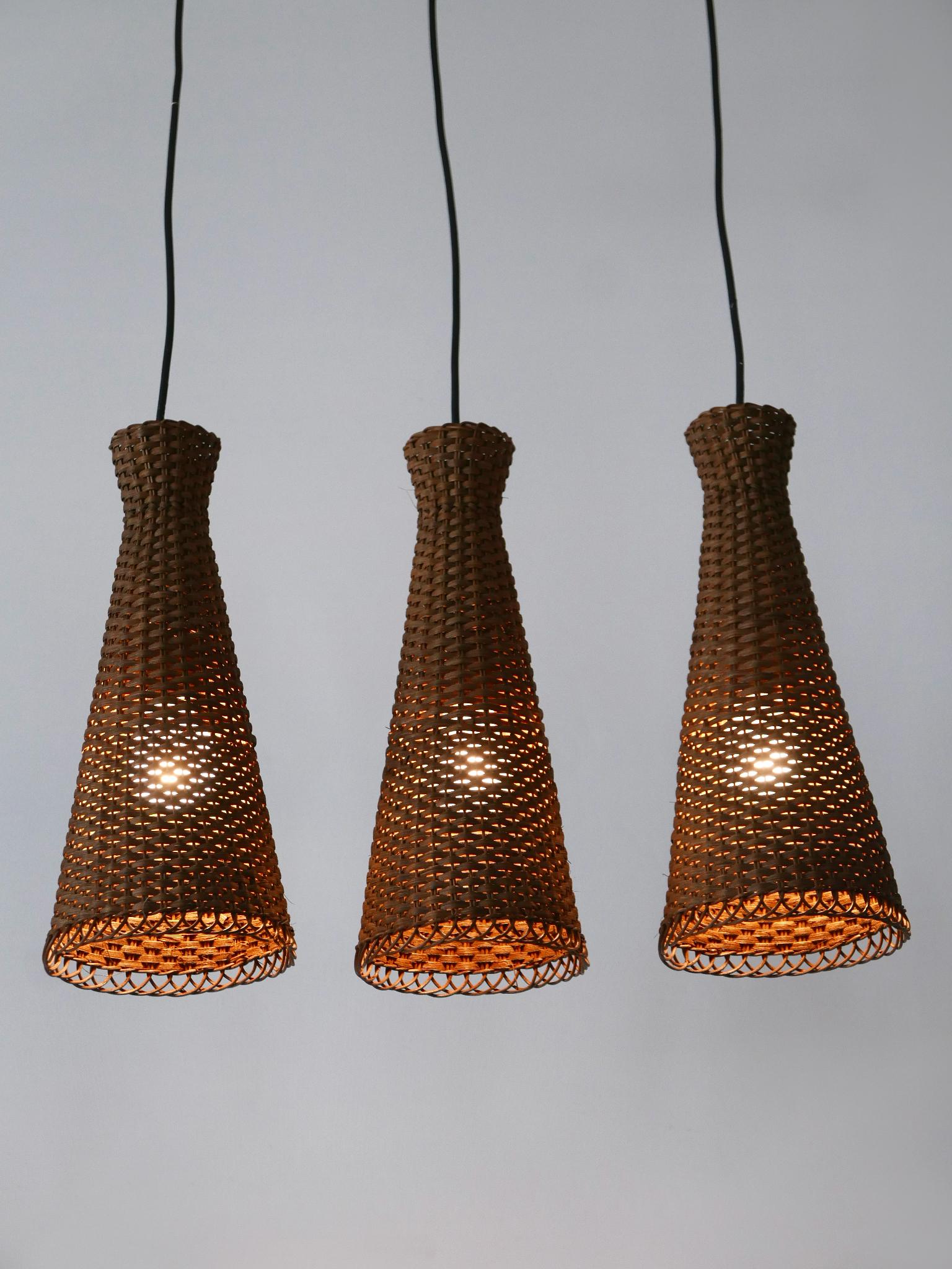 Satz von drei schönen modernen Rattan-Diabolo-Hängeleuchten aus der Jahrhundertmitte 1960er Jahre im Angebot 3