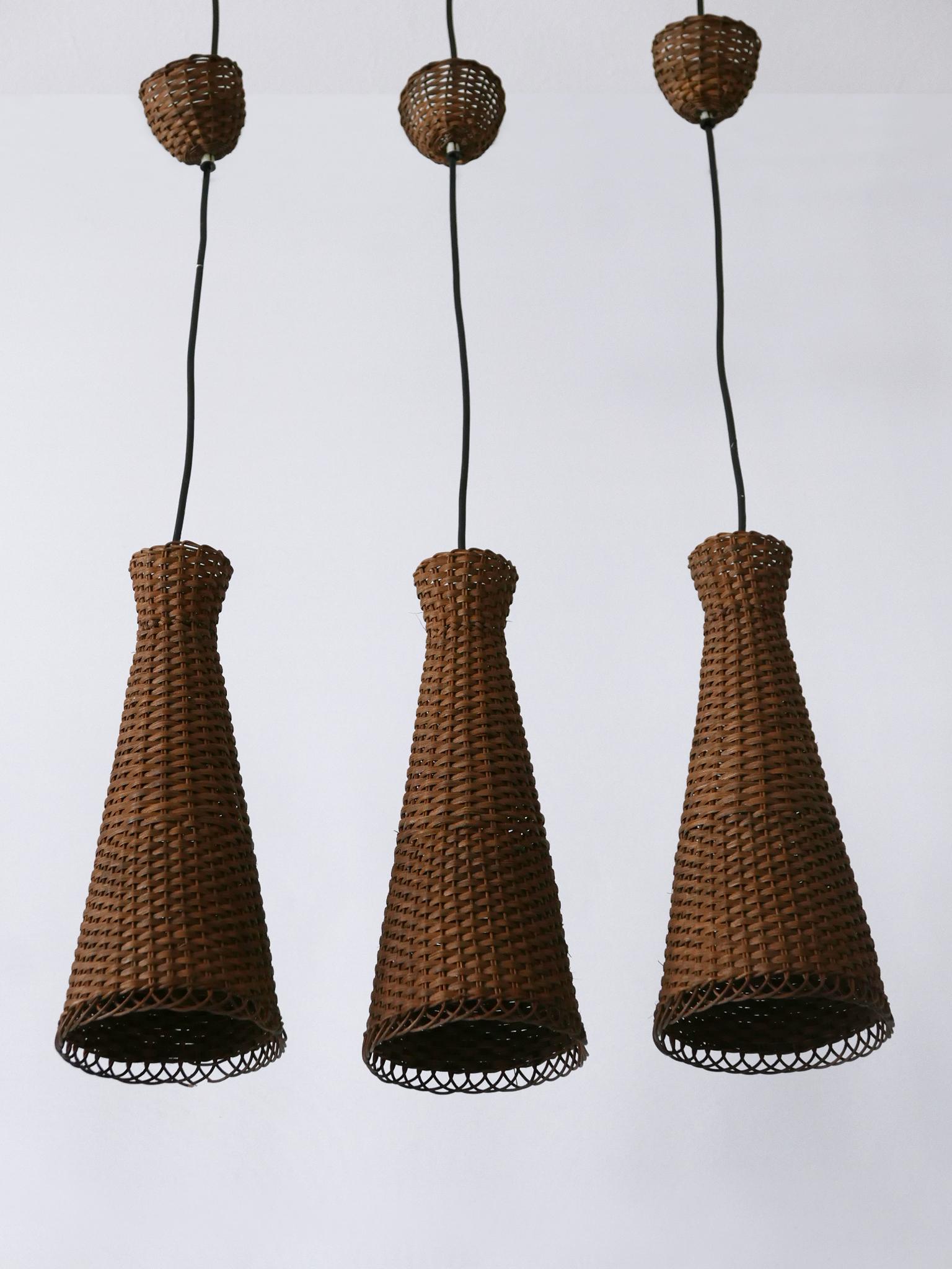Satz von drei schönen modernen Rattan-Diabolo-Hängeleuchten aus der Jahrhundertmitte 1960er Jahre im Angebot 4