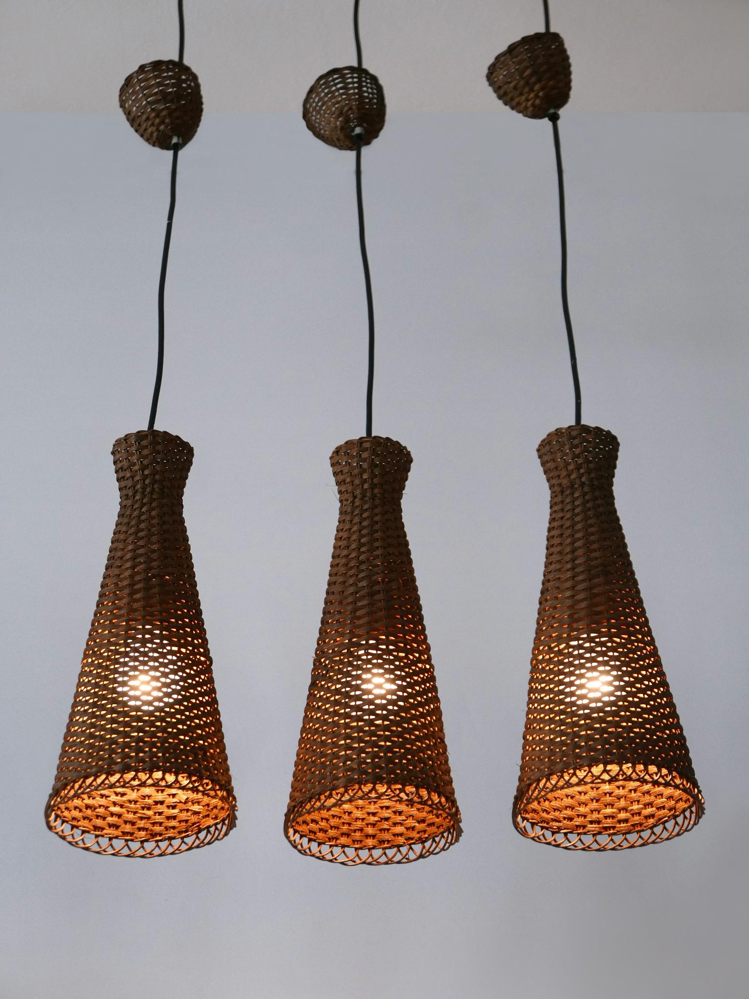 Satz von drei schönen modernen Rattan-Diabolo-Hängeleuchten aus der Jahrhundertmitte 1960er Jahre im Angebot 5