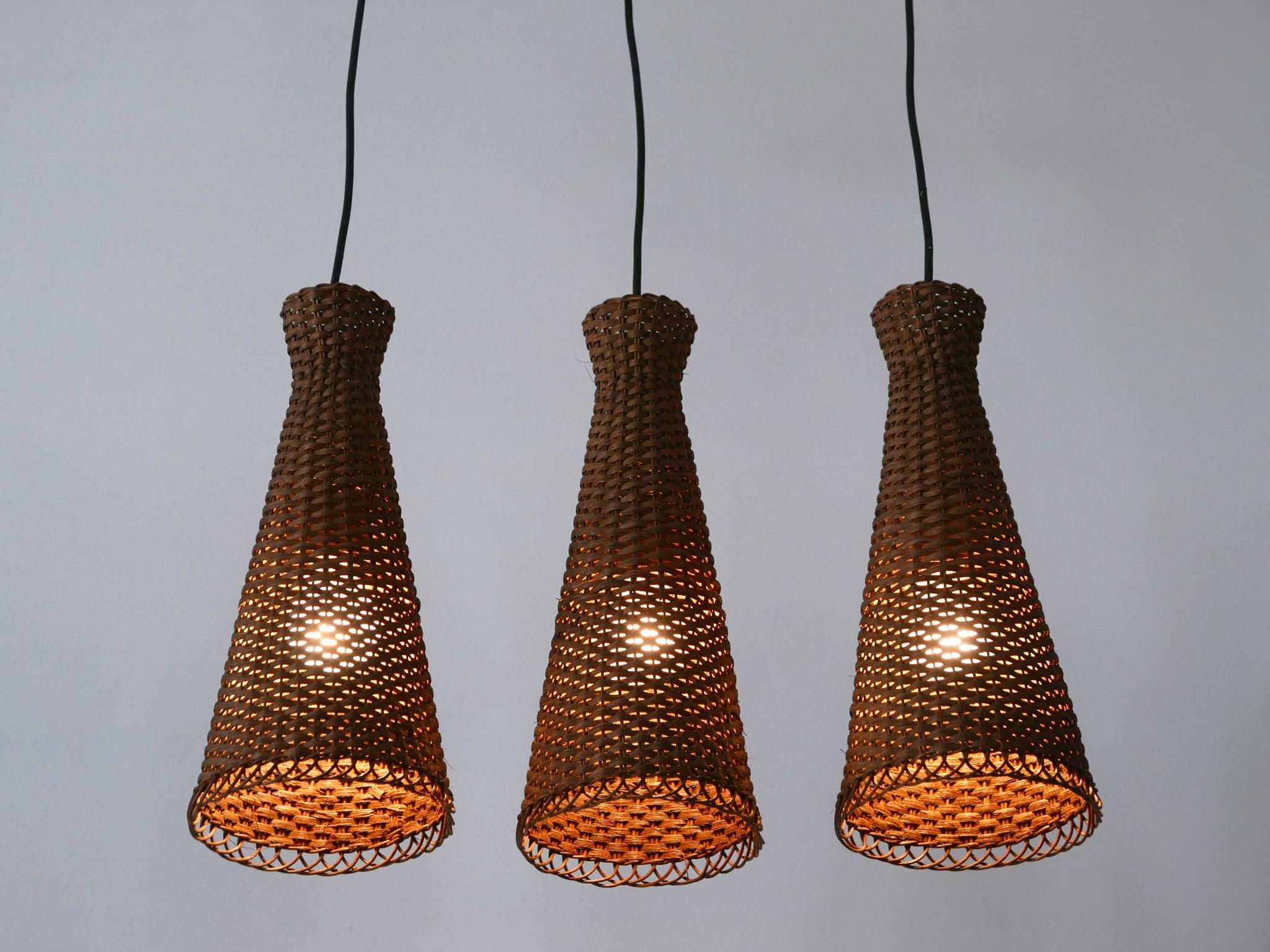 Satz von drei schönen modernen Rattan-Diabolo-Hängeleuchten aus der Jahrhundertmitte 1960er Jahre im Angebot 7