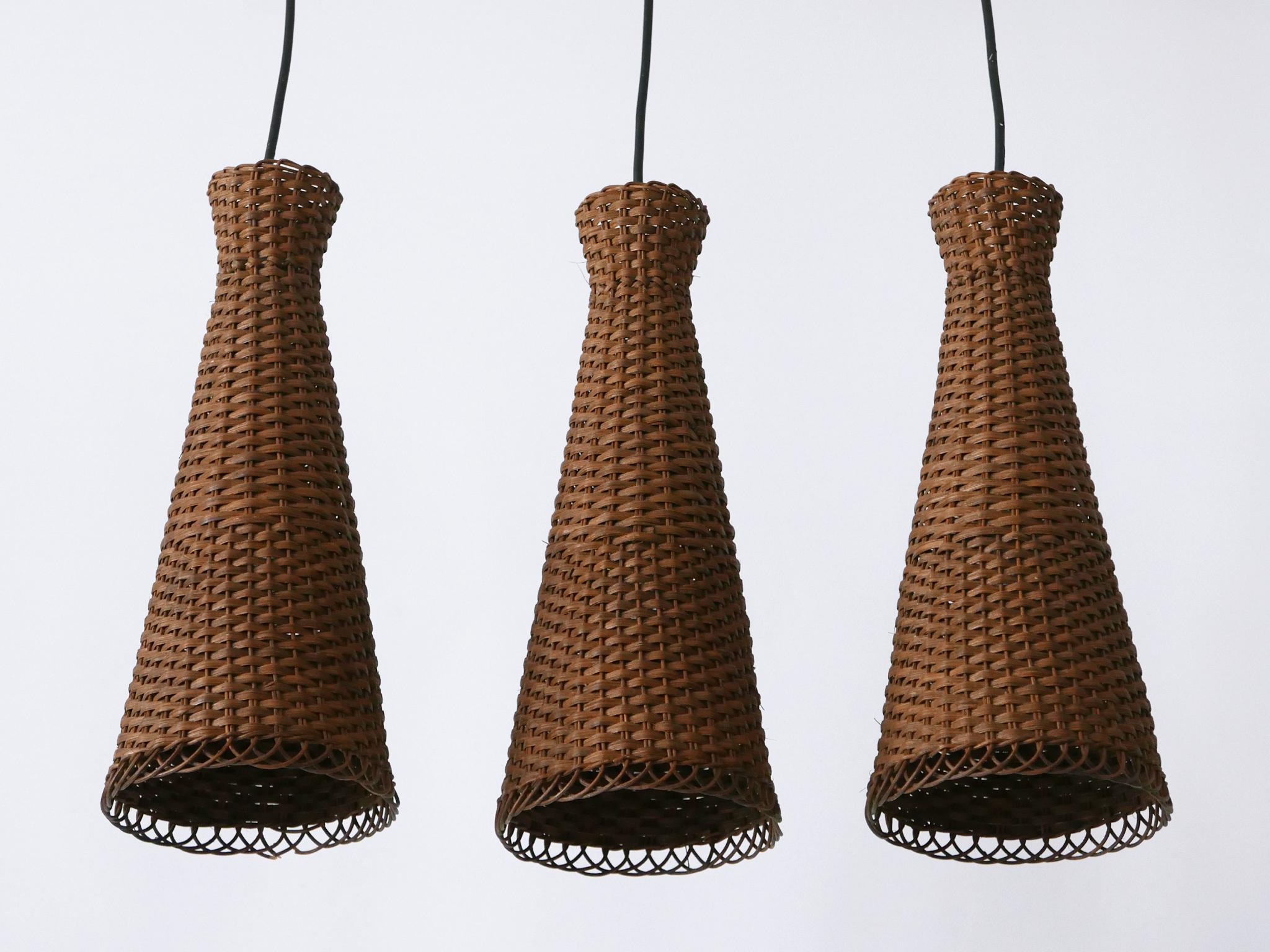 Satz von drei schönen modernen Rattan-Diabolo-Hängeleuchten aus der Jahrhundertmitte 1960er Jahre im Angebot 8