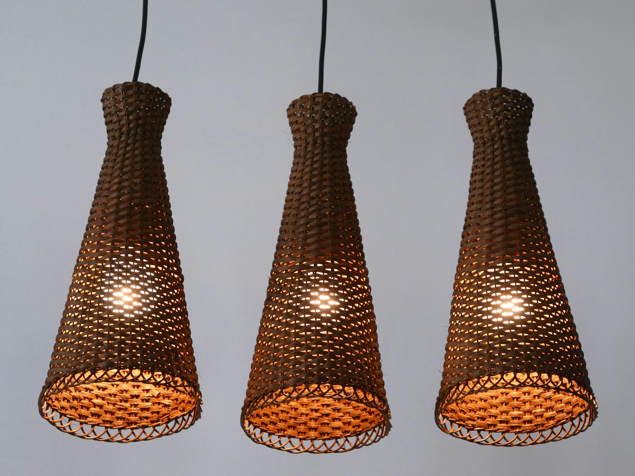 Satz von drei schönen modernen Rattan-Diabolo-Hängeleuchten aus der Jahrhundertmitte 1960er Jahre im Angebot 9