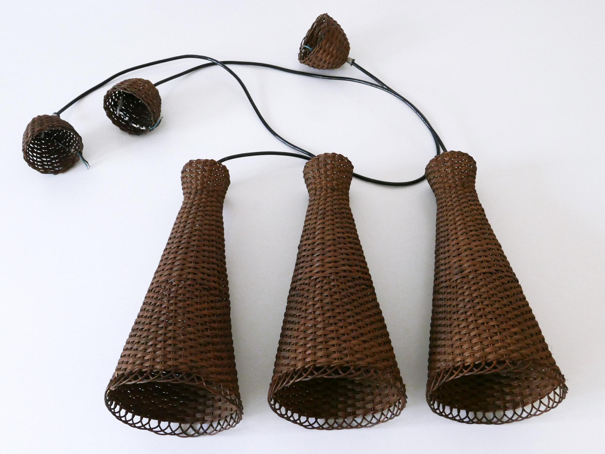 Satz von drei schönen modernen Rattan-Diabolo-Hängeleuchten aus der Jahrhundertmitte 1960er Jahre im Angebot 11