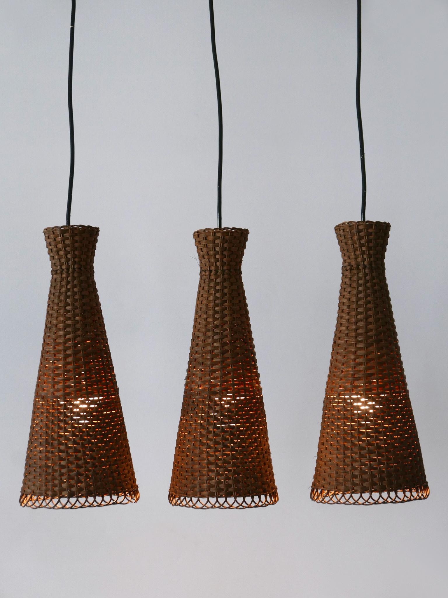 Satz von drei schönen modernen Rattan-Diabolo-Hängeleuchten aus der Jahrhundertmitte 1960er Jahre (Deutsch) im Angebot