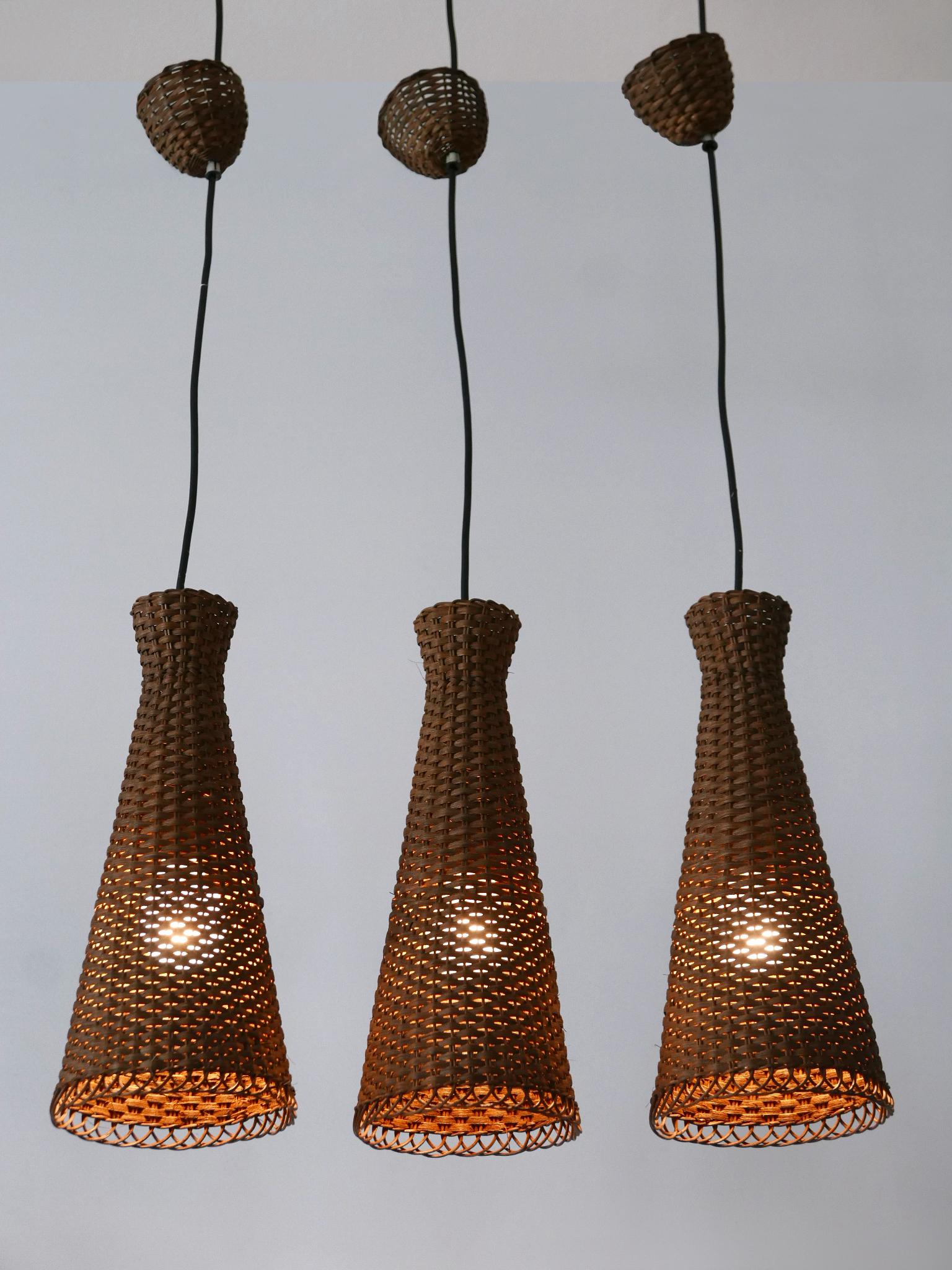 Satz von drei schönen modernen Rattan-Diabolo-Hängeleuchten aus der Jahrhundertmitte 1960er Jahre im Angebot 2