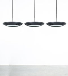 Set of Three Lumi Ceiling Pendants Black Satin Glass, Italy, circa 1960