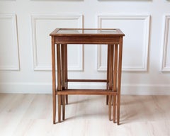 Set of Three Mahogany Nesting Tables with Glass Tops, France, Mid-20th Century