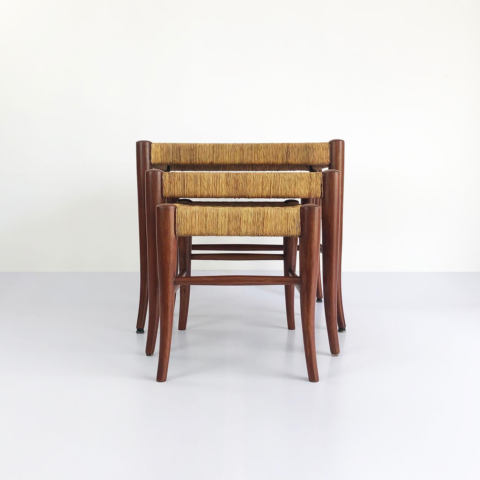 Circa 1960. We offer this midcentury set of three Mahogany tables attributed to Charles Allen, made in premium mahogany wood and palm cords.

Measurement units:
Big: H. 47 cm. W. 41 cm. D. 52.5 cm.
Medium: H. 40 cm. W. 39 cm. D. 41 cm.
Small: