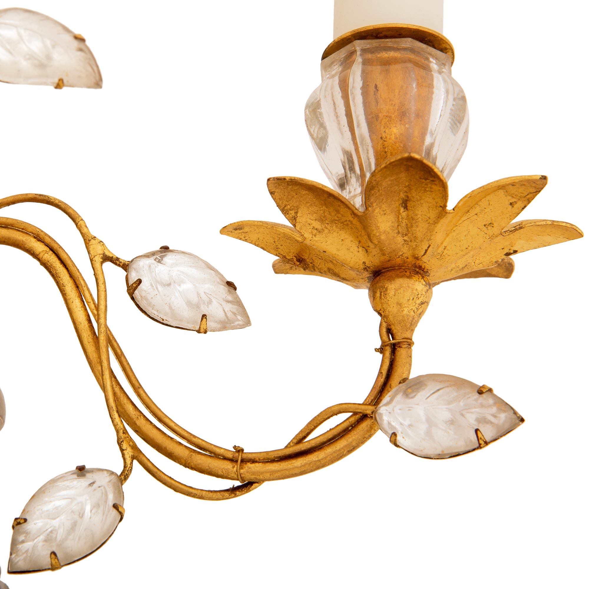 Metal set of three Maison Bagues Gilt, Silvered Leaf, and Crystal sconces For Sale