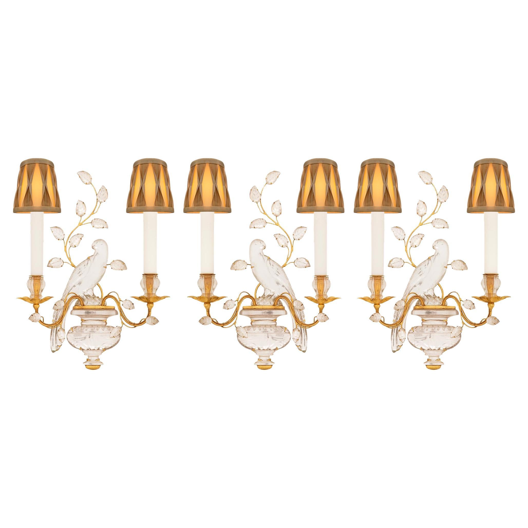 set of three Maison Bagues Gilt, Silvered Leaf, and Crystal sconces