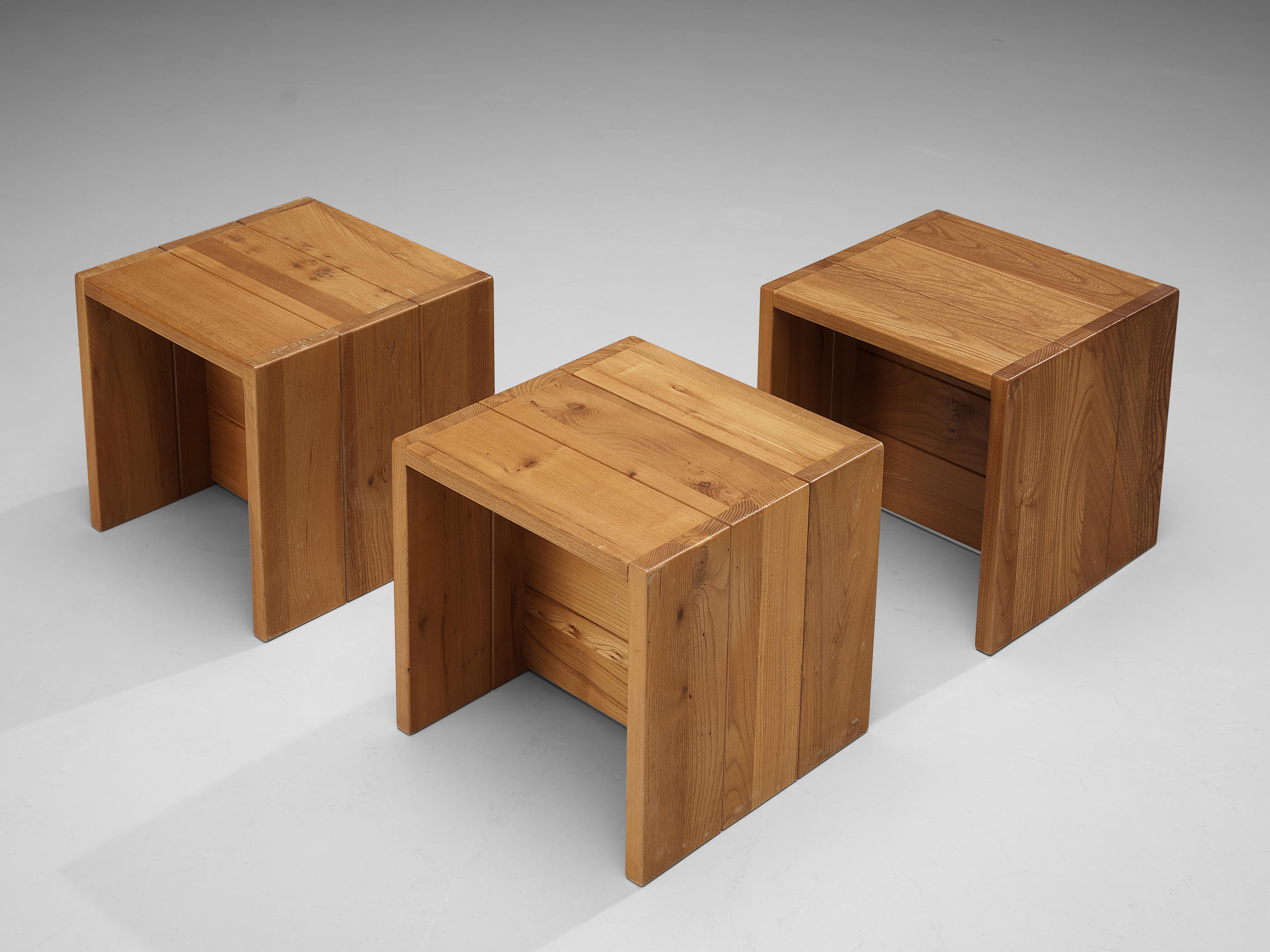 Maison Regain, set of three side tables, solid elm, France, 1970s

Versatile and playful set of side tables that can be place in different positions due to its cubical shape. The design features clean lines and a sturdy overall appearance. The