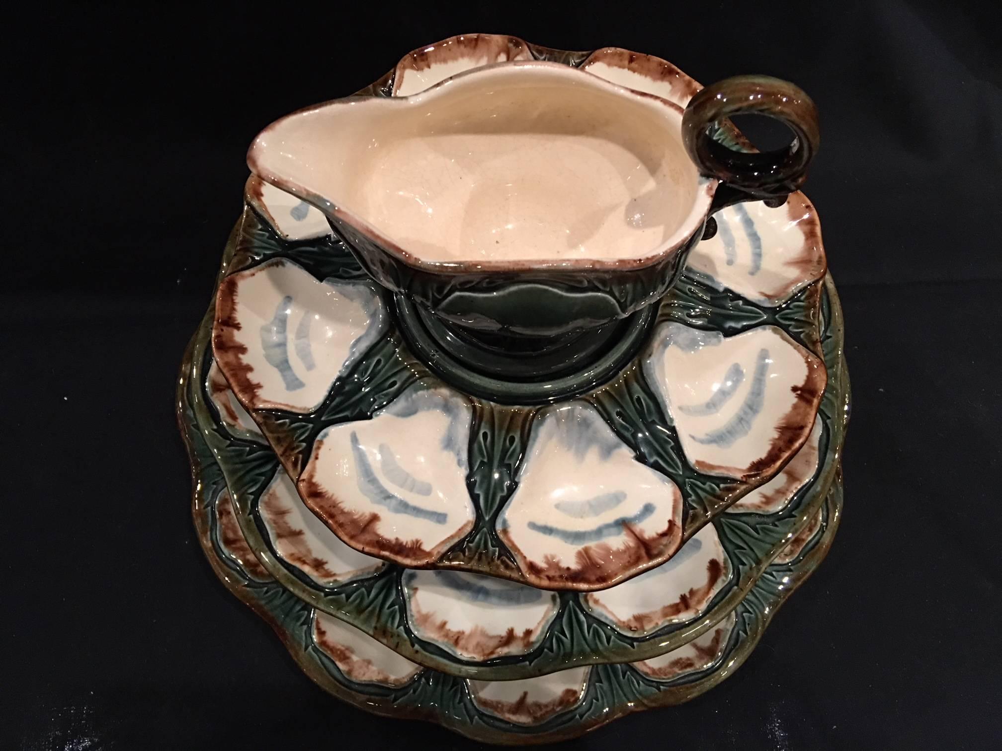 French Set of Three Majolica Long Champ Oyster Platters and a Sauce Boat, 19th Century