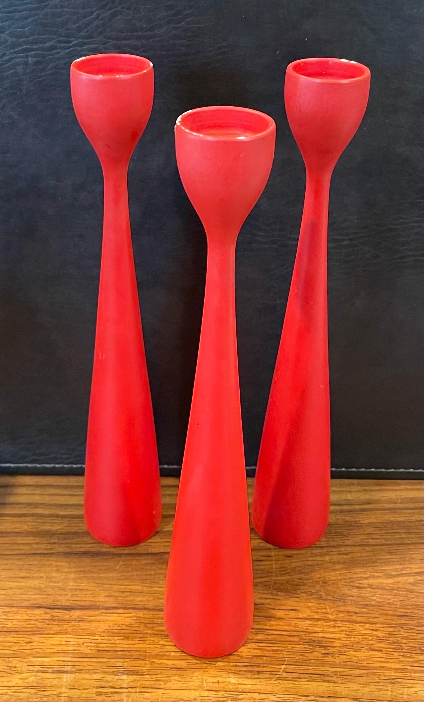 Danish Set of Three MCM Red Hardwood Candlesticks by Illums Boulghus For Sale