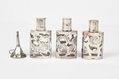 Set of Three Mexican Floral Sterling Silver Overlay Perfume Bottles with Funnel
