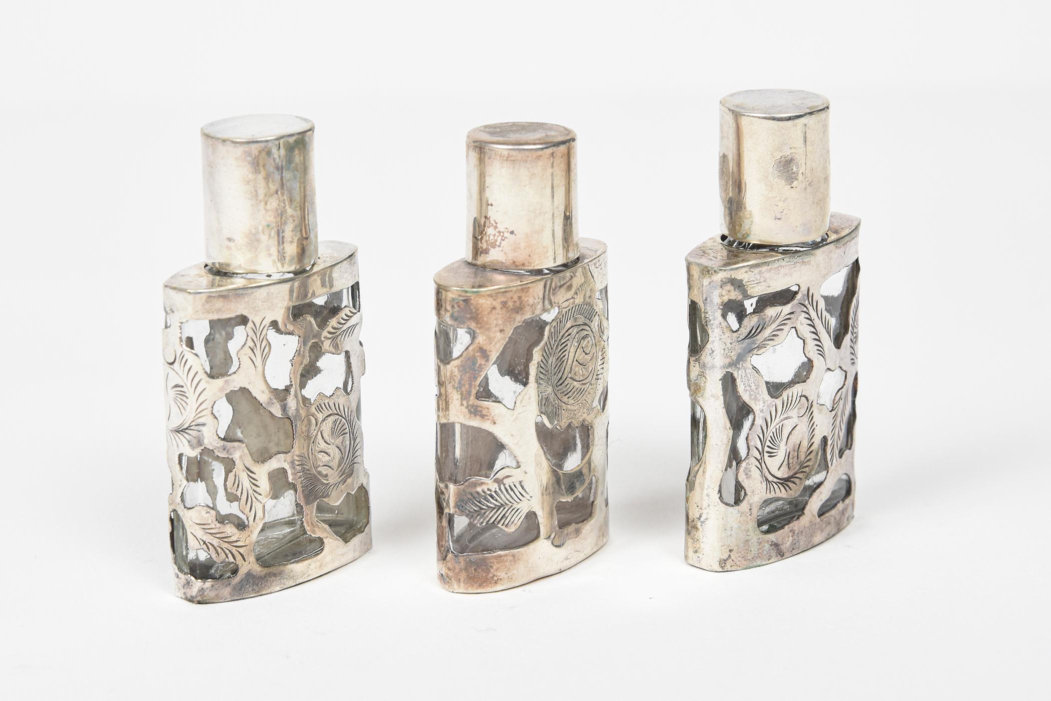 Set of Three Mexican Floral Sterling Silver Overlay Perfume Bottles with Funnel In Good Condition For Sale In Miami Beach, FL