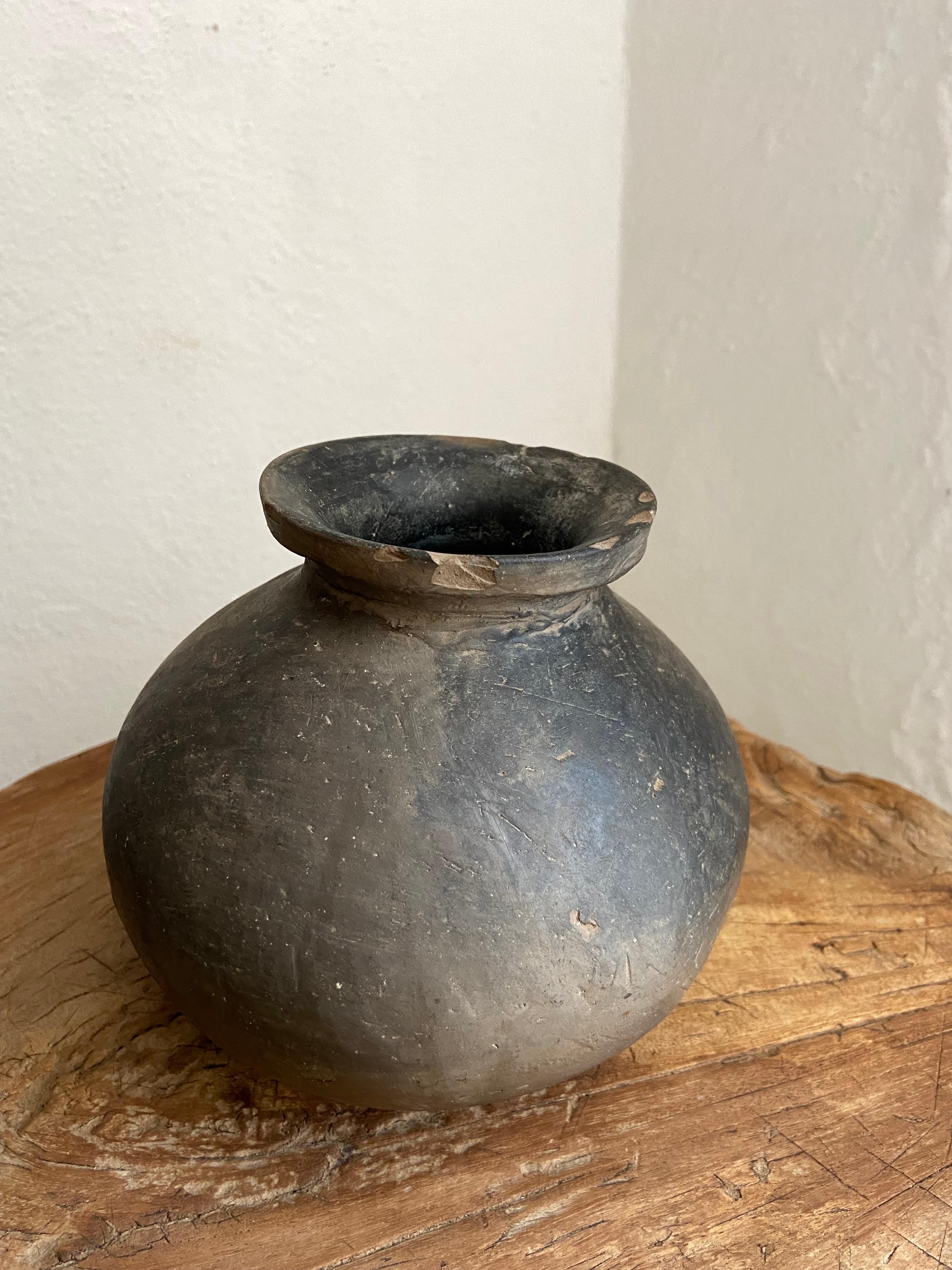Rare set of three black clay mezcal vessels from Oaxaca, Mexico, circa 1940's. Acquired in Santa Maria Peñoles, Mixteca province, Oaxaca. The vessels were most likely used as folk art pieces to be sold to tourists in the 40´s and 50´s.