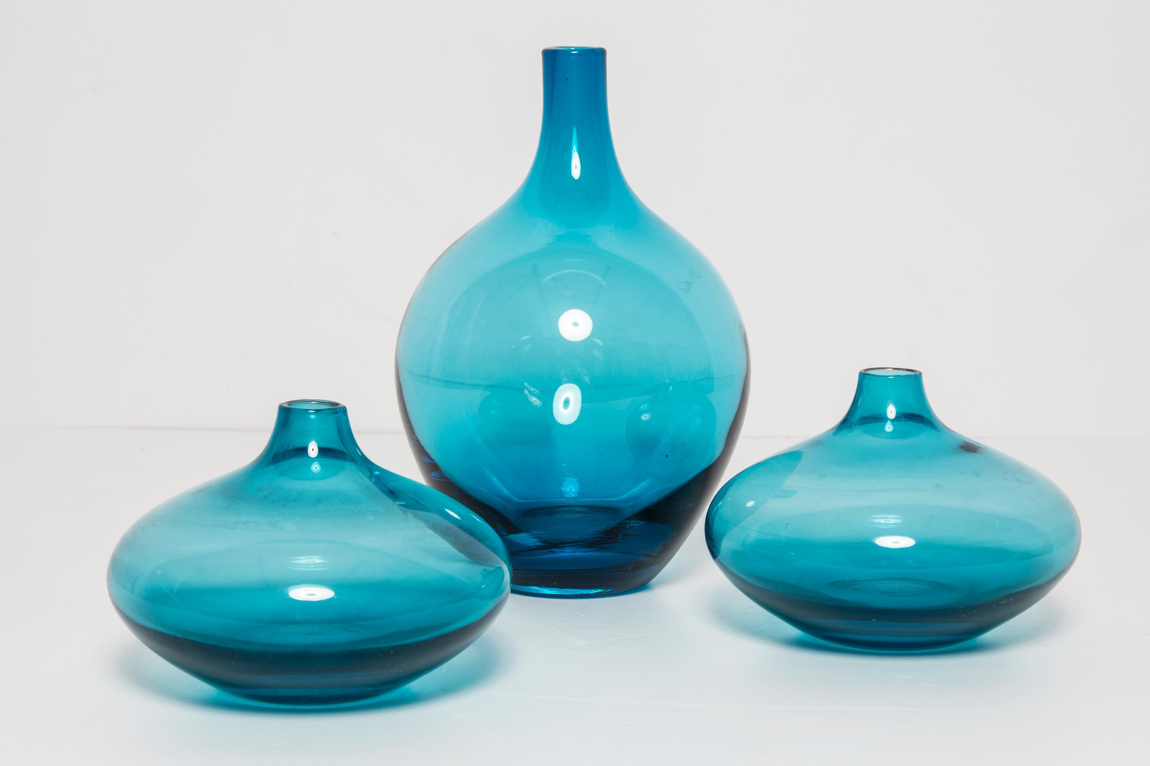 Set of three Mid Century polish modern glass vases, circa 1960. Very good condition. No damages. Beautiful blue glass.