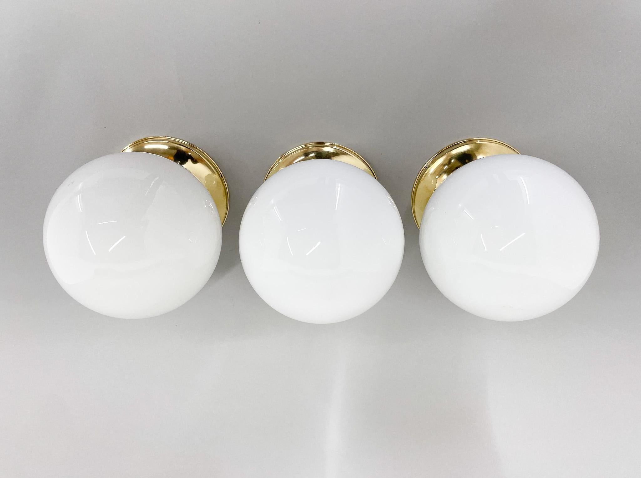 Mid-Century Modern Set of Three Mid-Century Brass and Milk Glass Ceiling Ligts, Restored For Sale
