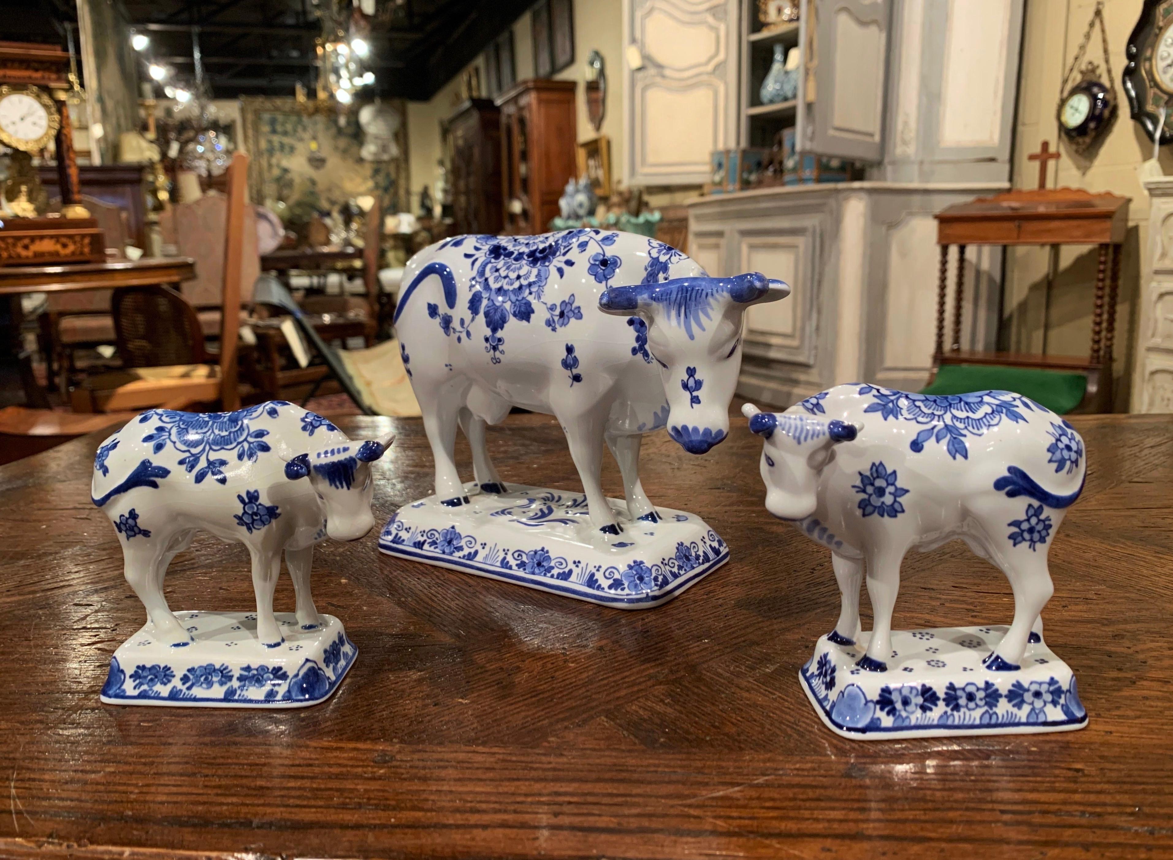 Set of Three Midcentury Dutch Hand Painted Porcelain Delft Cows In Excellent Condition In Dallas, TX